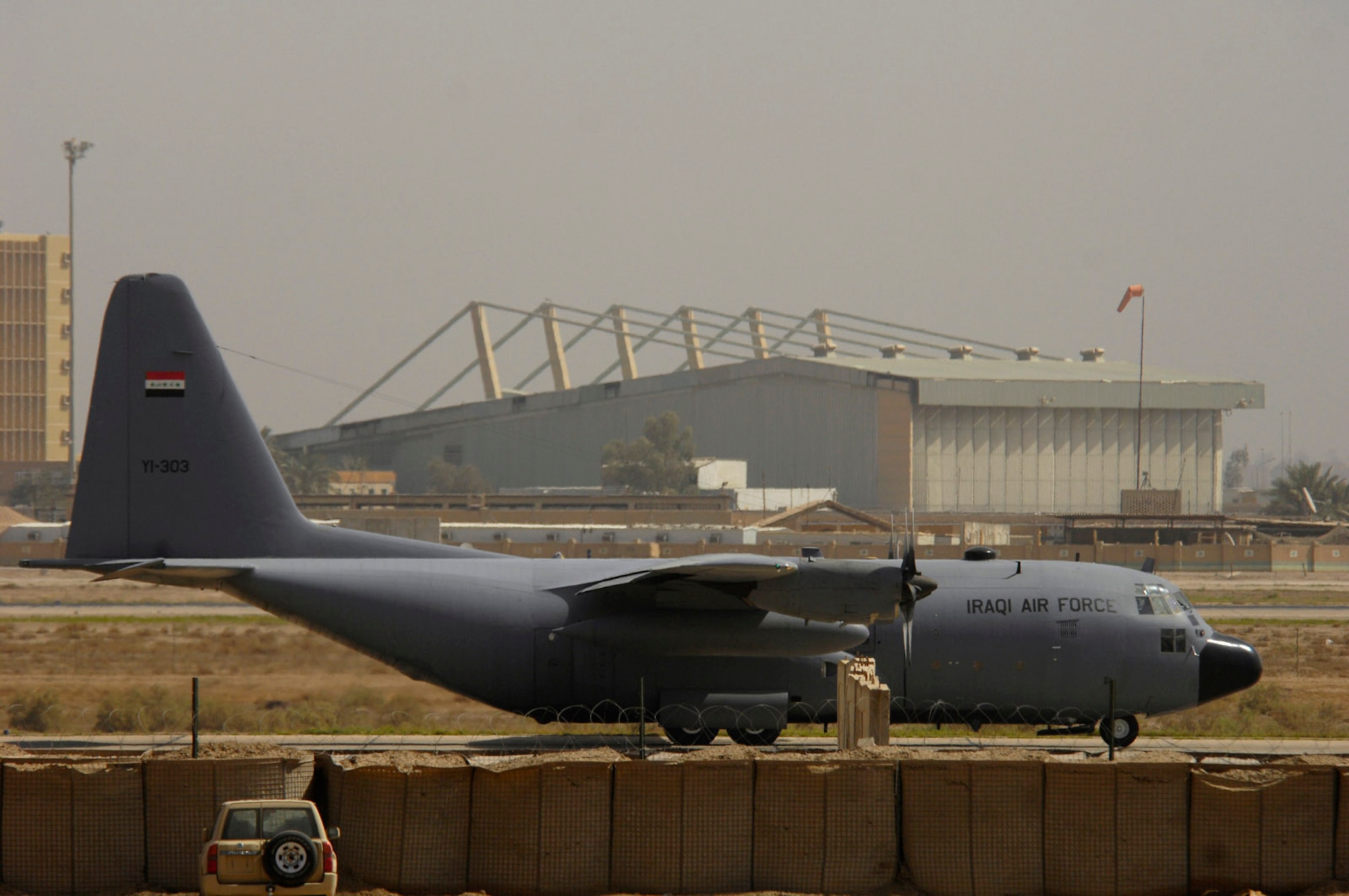 An Iraqi air force C-130 Hercules loaded with Iraqi army soldiers taxies to the runway before a March 30 flight to Basra, Iraq, at New Al Muthana Air Base, Iraq. All processing, loading and transporting of the Iraqi troops is being conducted by the Iraqi air force. (U.S. Air Force photo/Tech. Sgt. Jeffrey Allen) 
