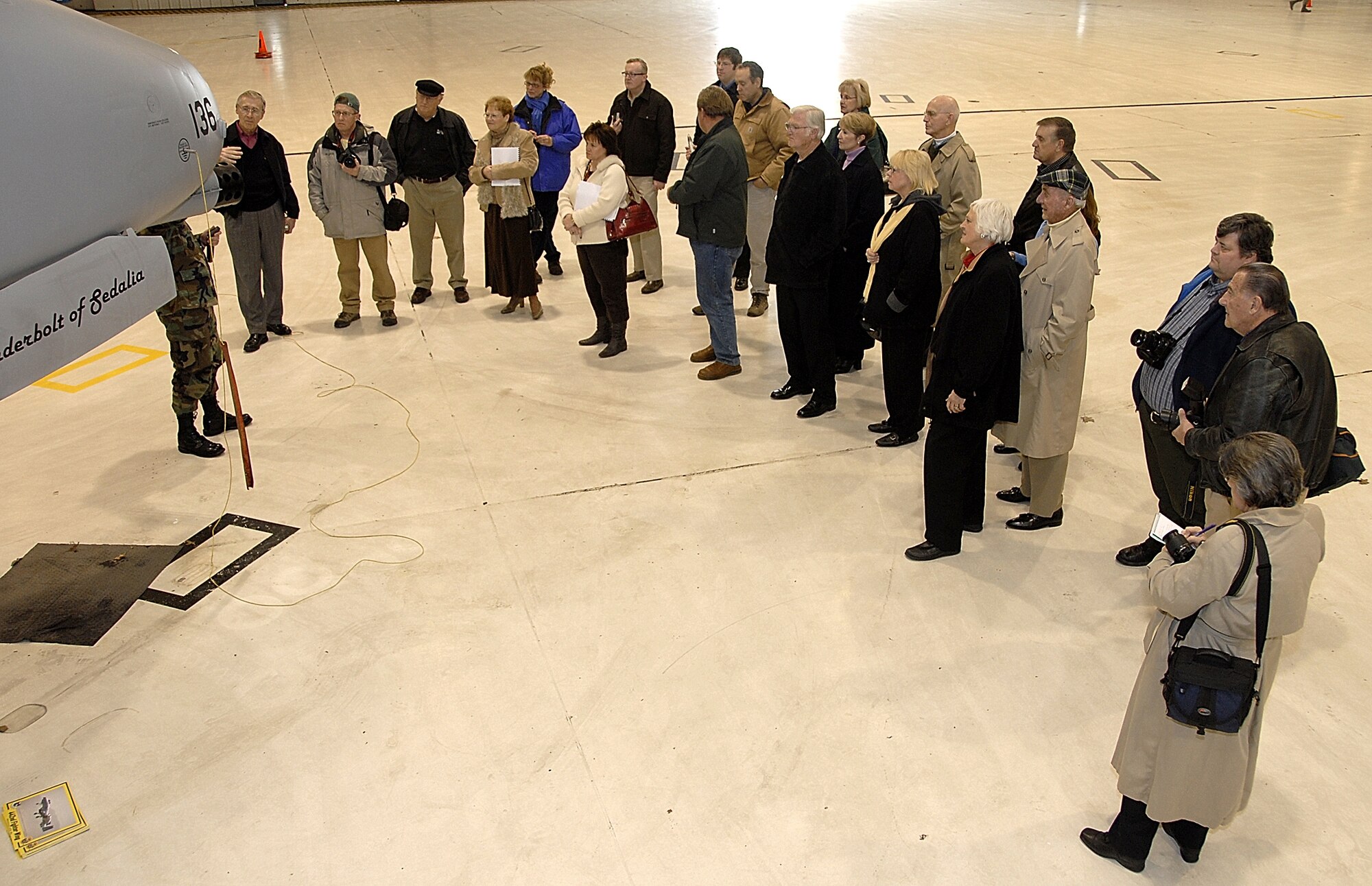 WHITEMAN AIR FORCE BASE, Mo. -- Members of the Whiteman Base Community Council from Jefferson City and Higginsville, Mo., listen to a briefing about the 442nd Fighter Wing and its A-10 Thunderbolt IIs Feb. 7.  The BCC meets on the base every month and featured communities are treated to a base tour.  The organization is one of four local civic groups whose charters are to support the base, its Airmen and military families. (US Air Force photo/Master Sgt. Bill Huntington)