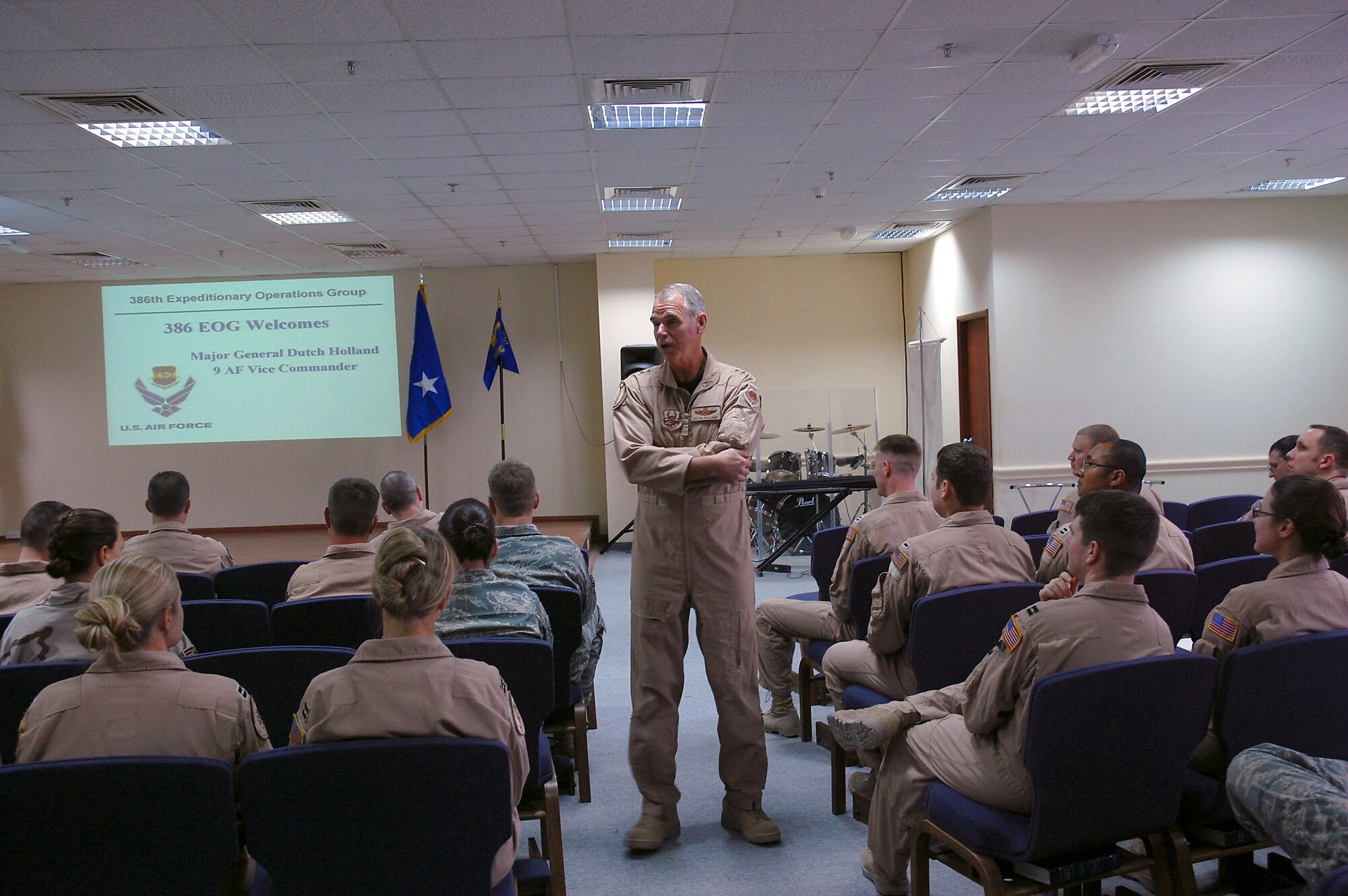 Maj. Gen. William L. Holland speaks with members from the 386th Expeditionary Operations Group April 2 at a Southwest Asian air base. General Holland is the 9th Air Force vice commander and the deputy commander of U.S. Air Forces Central from Shaw Air Force Base, S.C. He visited the area of responsibility to thank the Airmen for what they do and to take back any inputs on how to better train and equip the Airmen supporting operations Iraqi Freedom and Enduring Freedom. (U.S. Air Force photo/Staff Sgt. Patrick Dixon) 
