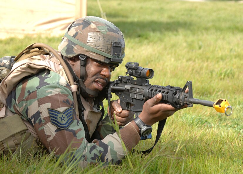 Tech.Sgt. Kevin Jiles of the 572nd Global Mobility Readiness Squadron at Travis Air Force Base, Calif. proves that concentration is key when you are in a Security Forces Flight. This mock combat was part of a demonstration that the Contingency Response Wing put on to show members of the local organization Leadership Vacaville what types of missions Travis supports.  (U.S. Air Force photo by: Civ/Laura Fentress)