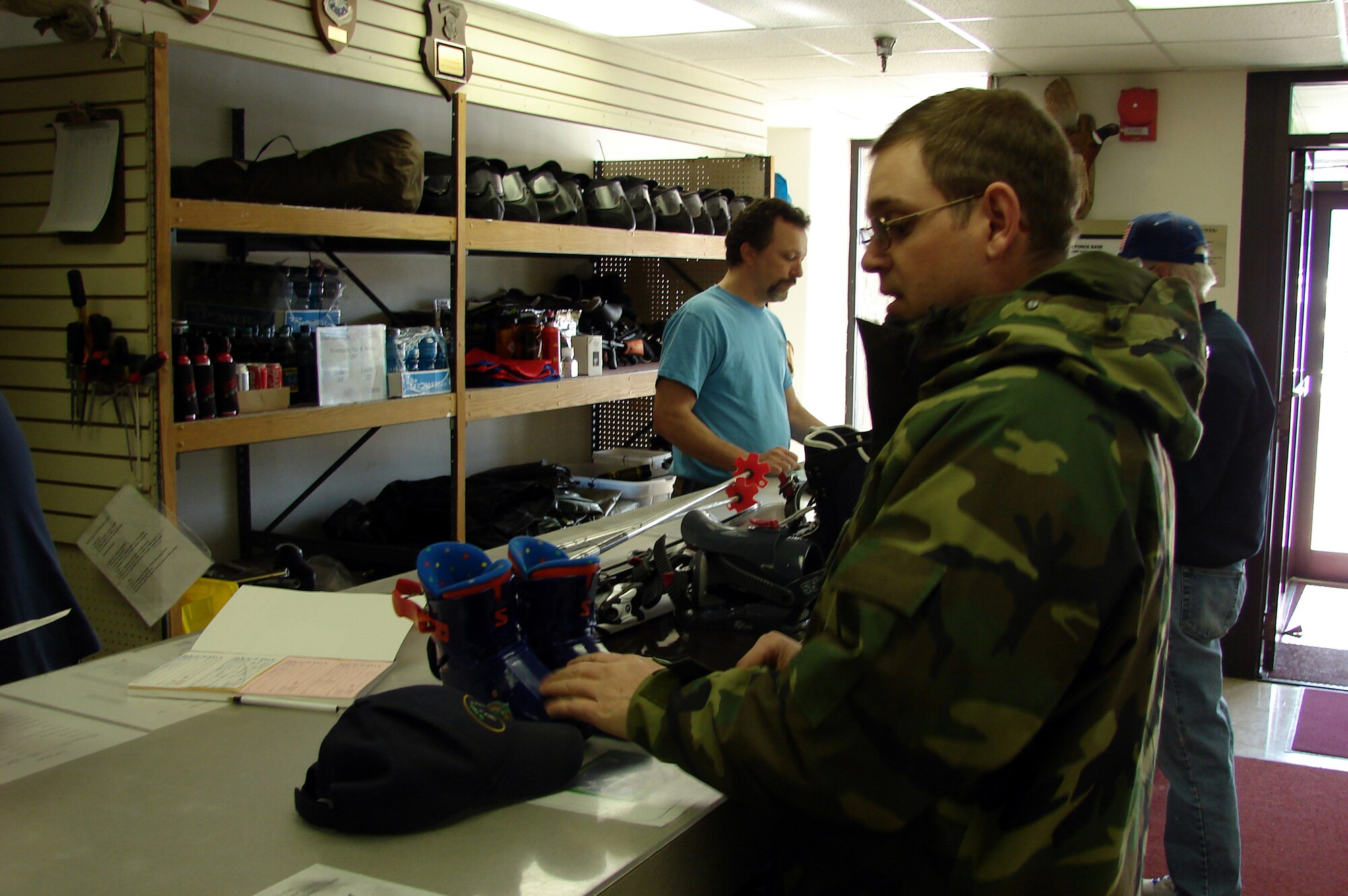 Tech. Sgt. Dustin Funkhouser, 341st Missile Maintenance Squadron, returns ski equipment to Outdoor Recreation April 1.  The Services Squadron will be evaluated for the Air Force-level Maj. Gen. Eugene L. Eubank Award April 7 to 11.  (U.S. Air Force Photo/2nd Lt. Korry Leverett) 