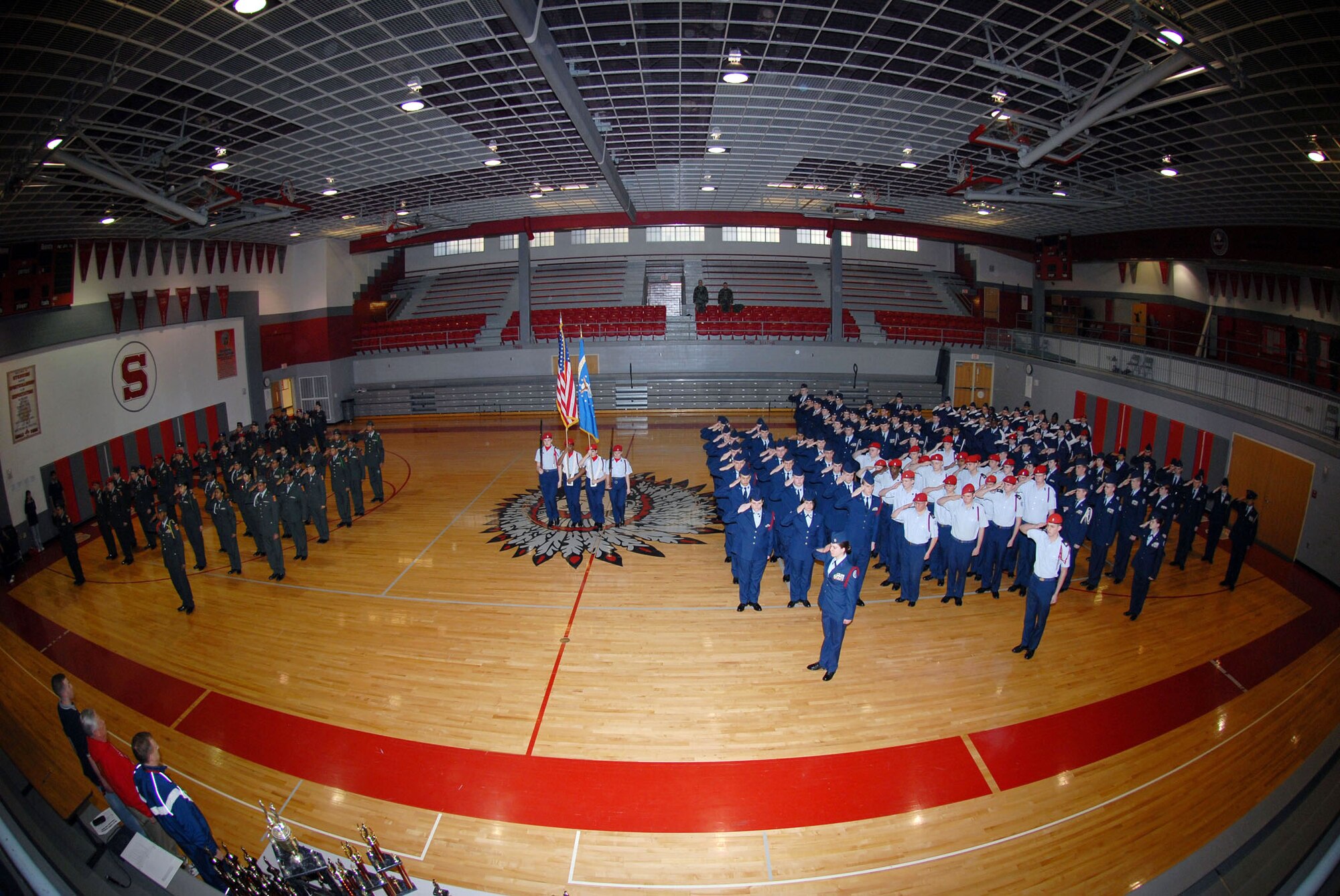 Two hundred Air Force and Army Junior ROTC cadets from eight high schools participate in the opening ceremony of the 15th Annual Memorial Junior ROTC Drill Championships March 29 at Walter E. Stebbins High School in Riverside, Ohio. Nineteen military members from the National Air and Space Intelligence Center from Wright-Patterson Air Force Base, Ohio, volunteered to be judges and work in other support positions during the competition. (U.S. Air Force photo/Master Sgt. Bonnie A. White)
