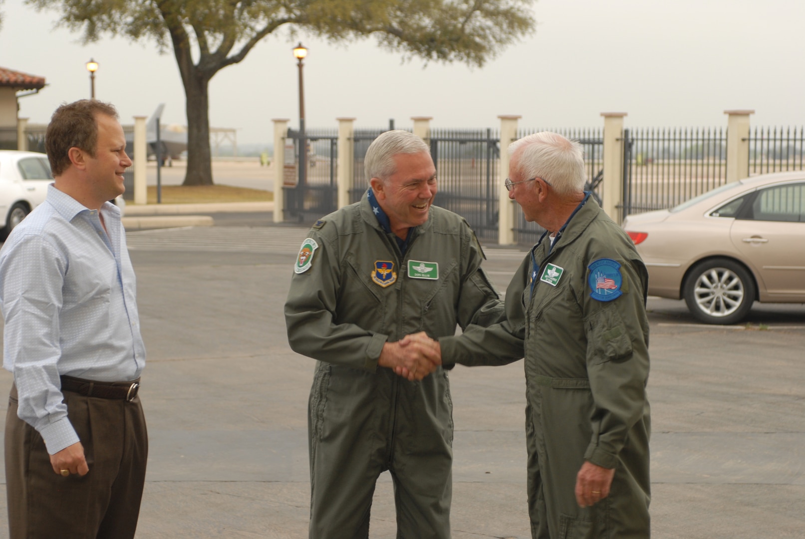 Retired Colonels Don Ellis and Carlyle ?Smitty? Harris greet each other during the Freedom Flyer reunion at Randolph. Colonel Ellis was commander of the 560th Fighting Training Squadron when Colonel Harris and other POWs were requalified as pilots. (U.S. Air Force photo by Steve White)