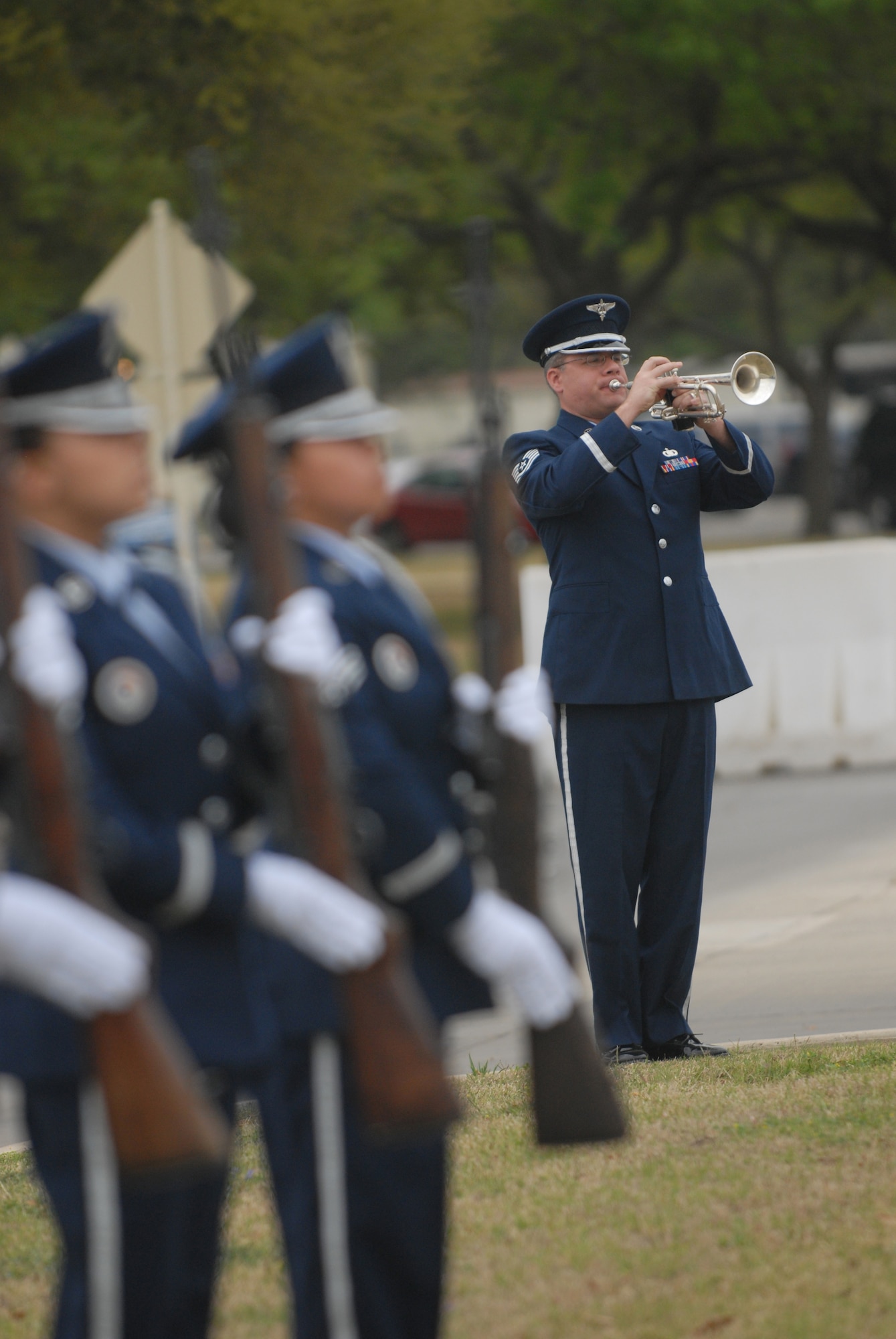 A bugler plays taps during the wreath-laying ceremony at the Missing Man Monument, one of the events for the 35th annual reunion of the Freedom Flyers, the Air Force aviators who were imprisoned during the Vietnam War and were later requalified as pilots by Randolph?s 560th Flying Training Squadron. (U.S. Air Force photo by Steve White)