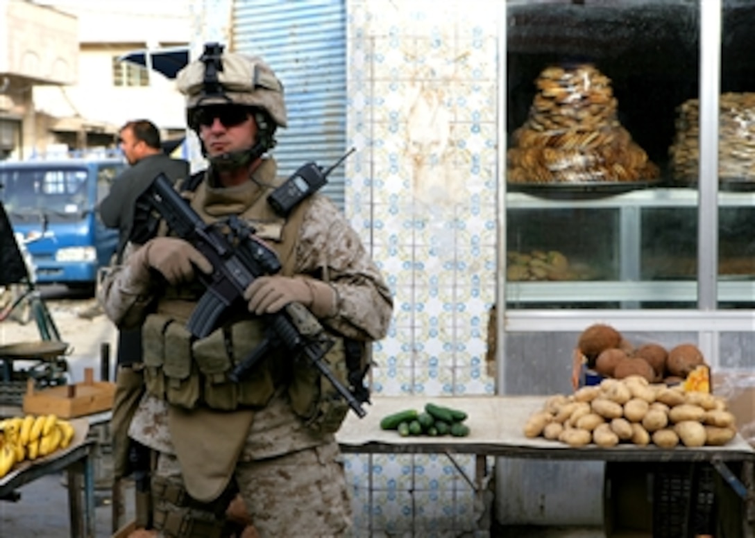 U.S. Marine Corps 1st Sgt. Robert W. Breeden patrols to provide security and assess living conditions in Ramadi, Iraq, March 18, 2008. Breeden is assigned to Company G, 2nd Battalion, 8th Marine Regiment.