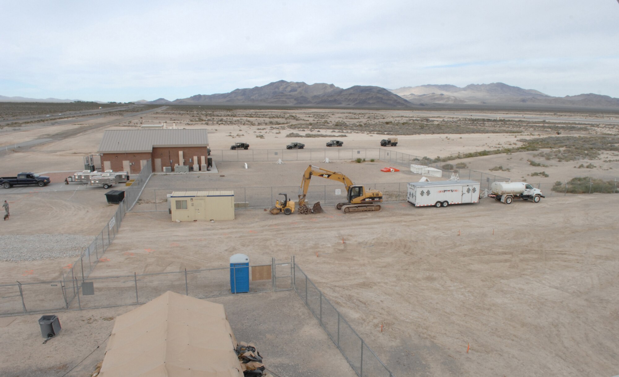 CREECH AIR FORCE BASE, Nev. -- The 99th Security Forces Ground Combat Training Squadron Military Working Dog element is currently building a new 1.47 million dollar, 4,300 square foot kennel facility to house 14 military working dogs. Once completed, the facility will become the second largest in the Air Force and will train 150 to 175 working dogs and handlers for deployment per year.
(U.S. Air Force Photo by Senior Airman Larry E. Reid Jr.)
