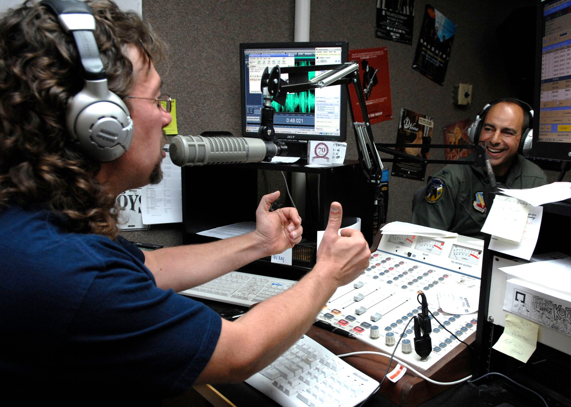 49th Fighter Wing Commander Colonel Jeff Harrigian talks to 94.3 Kyee, radio personality, Double J during the Commander's Corner on Apr. 4, 2008. (U.S. Air Force photo by Airman 1st Class Rachel A. Kocin)