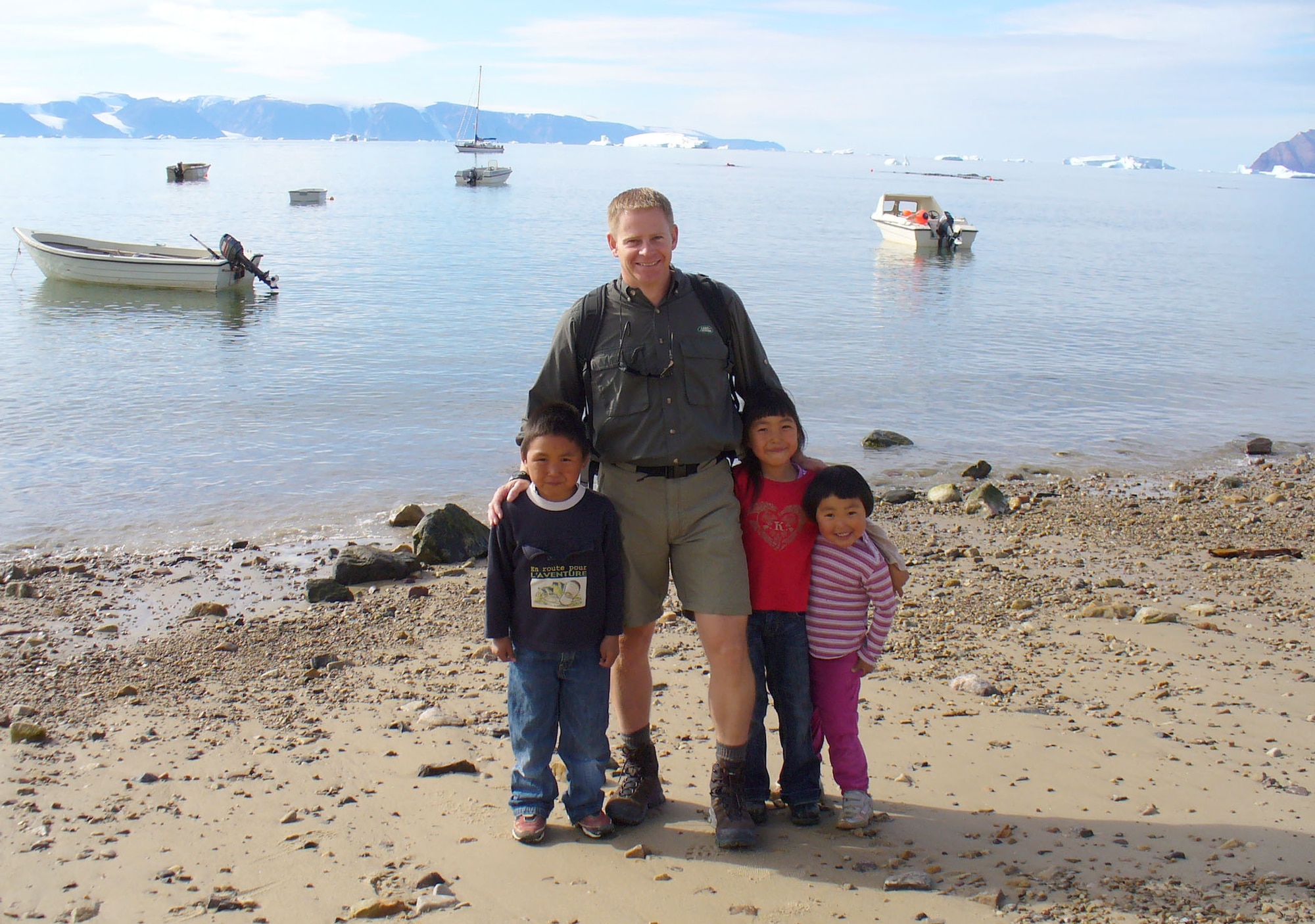 Members of the 21st Contracting Squadron’s Detachment 1 stand outside their office at the U.S. Embassy in Copenhagen, Denmark. The nine-member team handles all the contracts that provide life support – from running the base’s fitness and community centers to repairing the base’s pier – to Thule Air Base in Greenland. The vital support Det. 1 provides allows the men and women of Thule to monitor and provide early warning of intercontinental and sea-launched ballistic missile attacks against the continental U.S. and Canada. (Courtesy photo)