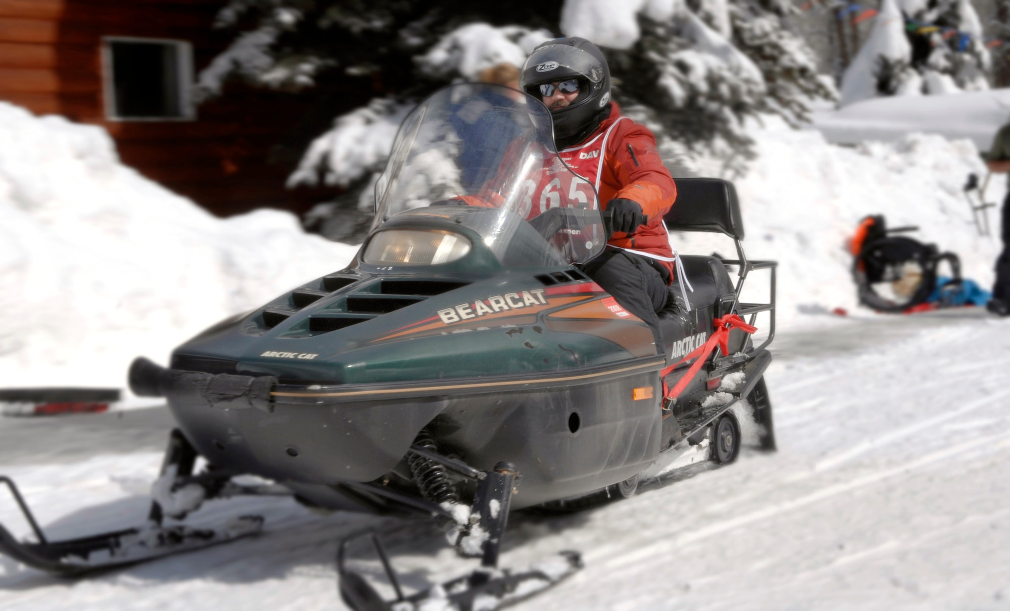 Disabled Air Force veteran, William Fry takes off on a snowmobile during the 22nd National Disabled Veterans Winter Sports Clinic held at the Snowmass Village, Colo., April 2. The annual disabled learn-to-ski clinic helps motivate and rehabilitate disabled Department of Defense veterans. It is the largest of its kind in the world. The clinic instructs veterans on Alpine and Nordic skiing, rock climbing, snowmobiling, sled hockey, and more. (U.S. Air Force photo/Tech. Sgt. Cecilio Ricardo)

