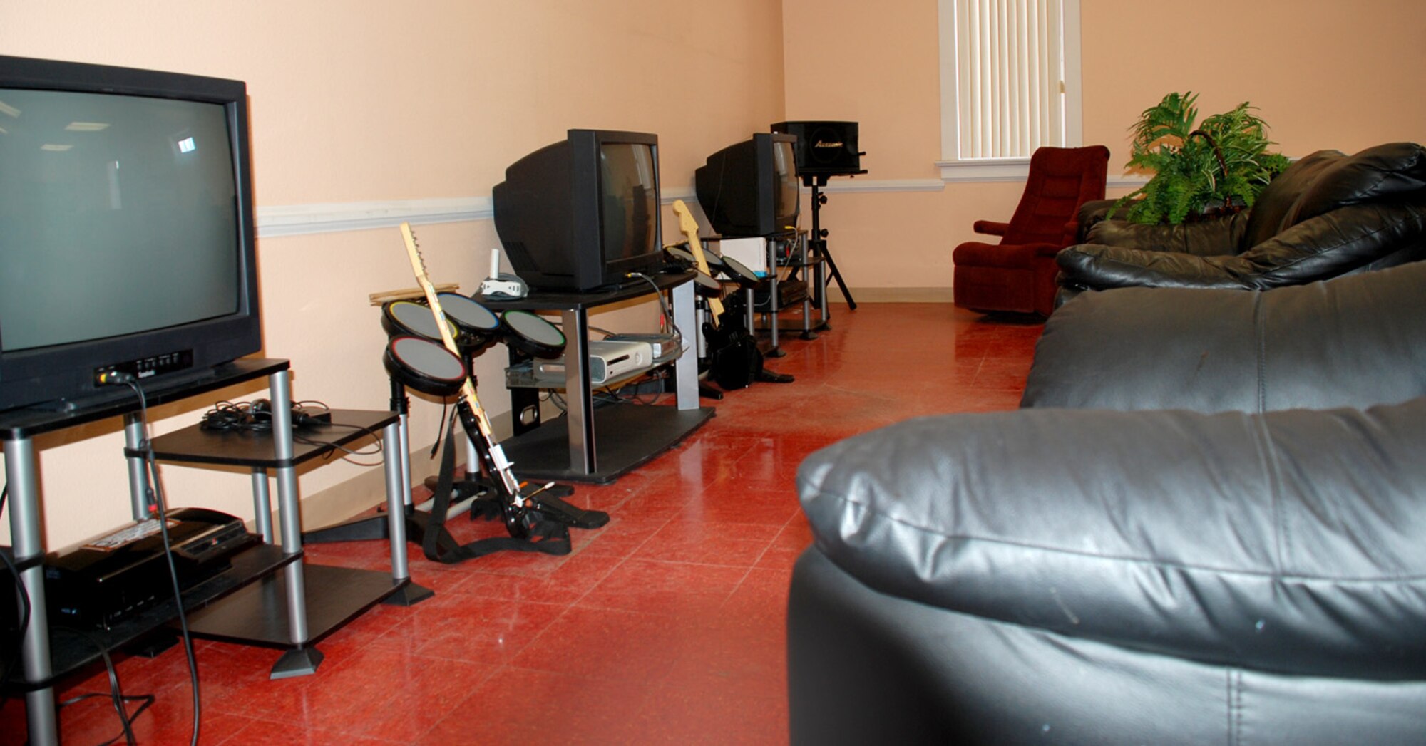 Couches and chairs line the video-game room in the "communibrary." The room has all the current gaming systems with Internet capability.