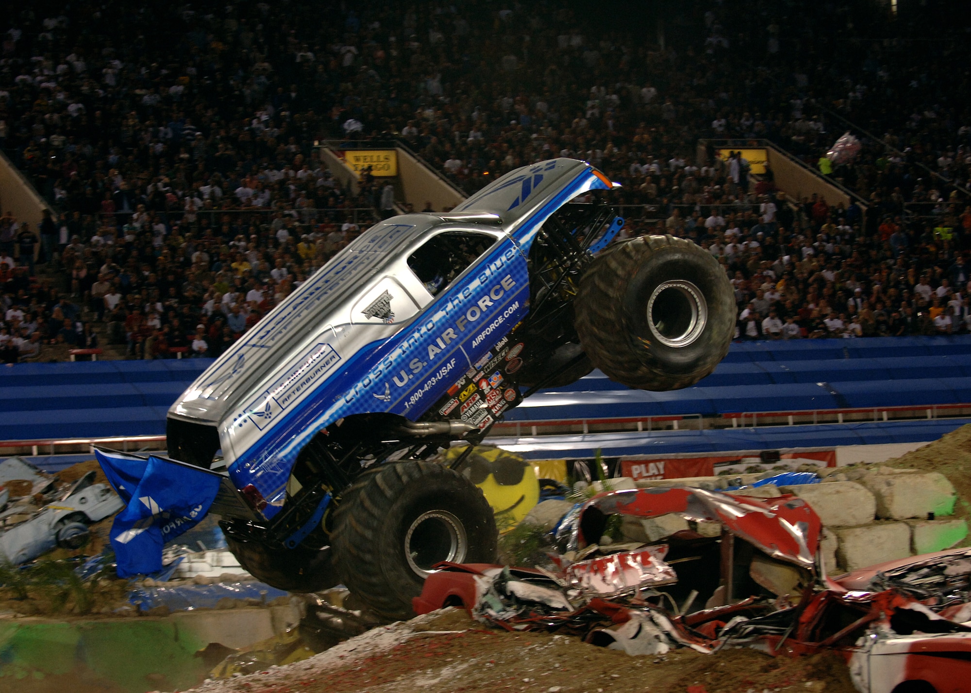 The Air Force sponsored monster truck "Afterburner," driven by Damon Bradshaw, manuevers over an obstacle at the Monster Jam World Finals in Las Vegas, Nev., March 29, 2008. (U.S. Air Force photo/Master Sgt. Scott Reed)