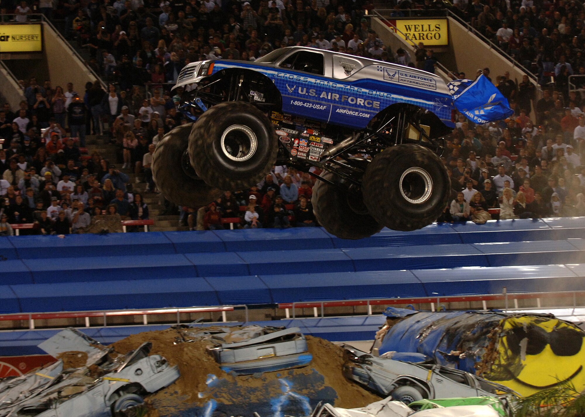 The Air Force sponsored monster truck "Afterburner," driven by Damon Bradshaw, flies over an obstacle at the Monster Jam World Finals in Las Vegas, Nev., March 29, 2008. (U.S. Air Force photo/Master Sgt. Scott Reed)