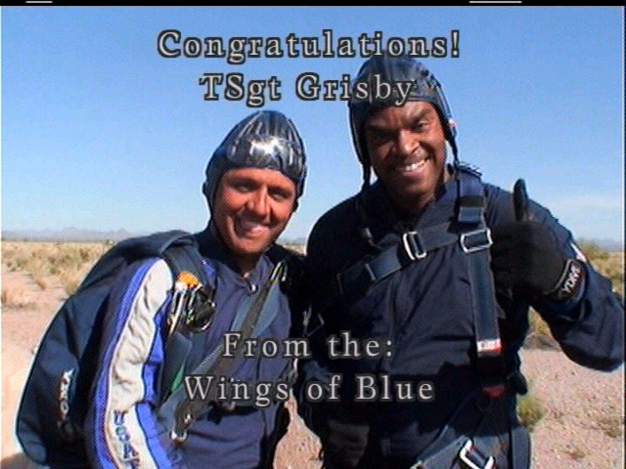 SEYMOUR JOHNSON AIR FORCE BASE, N.C. -- Tech. Sgt. Adolphus Grisby, a reservist with the 916th Services Flight, parachuted tandum-style while helping to support the Wings of Blue program in Arizona.