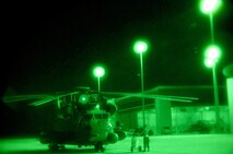 Airmen from the 1st Special Operations Helicopter Maintenance Squadron perform routine maintenance on a MH-53 Pave Low helicopter at Hurlburt Field, Fla., Aug. 1, 2007. (U.S. Air Force photo/Senior Airman Julianne Showalter)