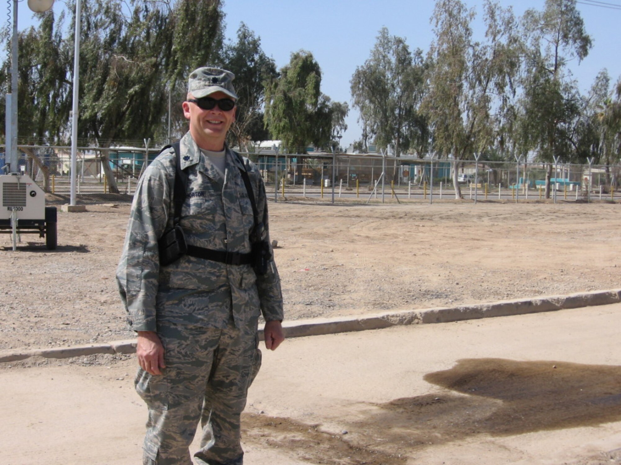 SEYMOUR JOHNSON AIR FORCE BASE, N.C. -- Lt. Col. Tim Horton, commander of the 916th Communication Squadron, stands in front of the hospital while stationed at Balad Air Base, Iraq.