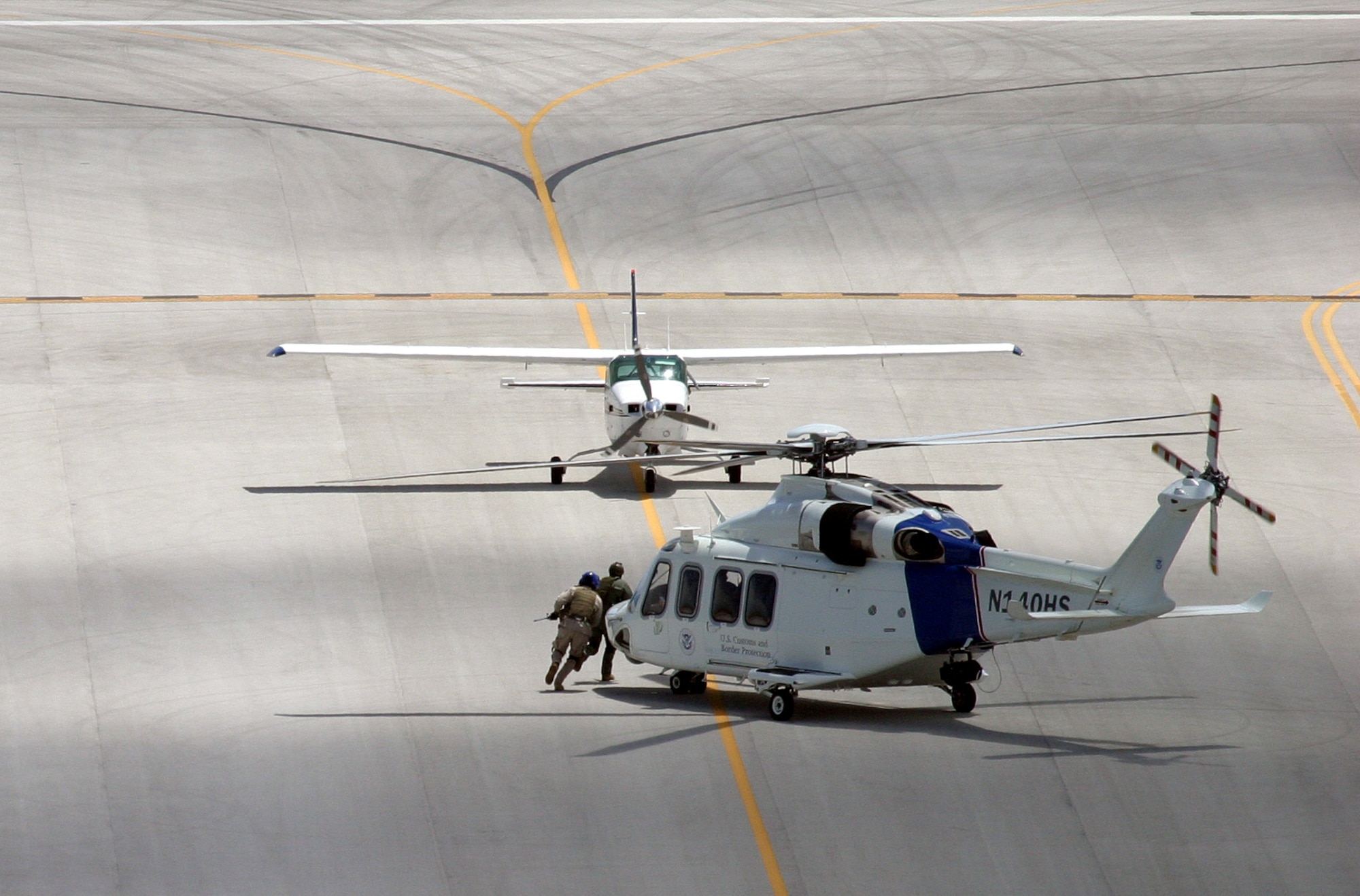 Agents from the U.S. Customs and Border Protection (CBP) Miami Air and Marine Branch, located at Homestead Air Reserve Base, perform an operational test and evaluation of an AgustaWestland AW139 helicopter during a training mission on April 2. The helicopter was tested for use in the air interdiction portion of the CBP mission to ensure federal law enforcement officers have the right equipment to safely and reliably conduct border security missions. (U.S. CBP courtesy photo)