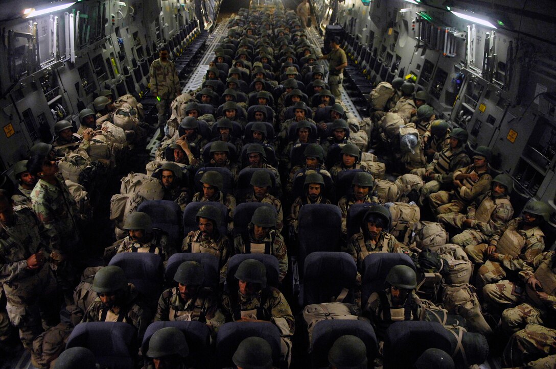 An Air Force C-17 Globemaster III transports members of the Iraqi army to Basra, Iraq, from New Al Muthana Air Base on April 2. The troops were supporting operations in the area. (U.S. Air Force photo/Tech. Sgt. Jeffrey Allen)