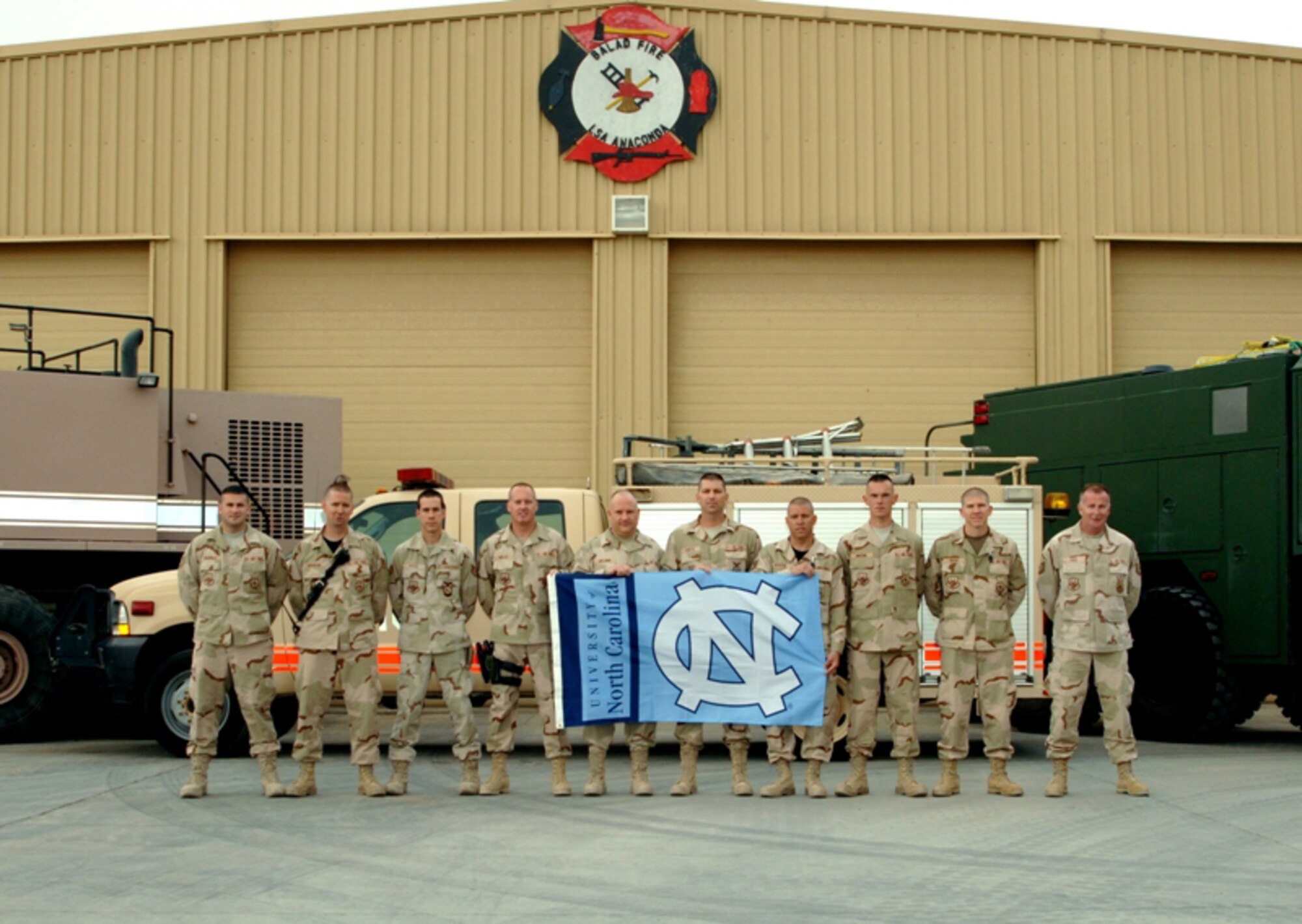 BALAD AIR BASE, Iraq -- Reservists from the 916th Civil Engineer Squadron show their support for the University of North Carolina as they prepare for the Final 4 Tournament this weekend. These Air Force Reserve firefighters are currently deployed to Balad, Iraq, but obviously their thoughts are not far from home as they cheer on their home team against Kansas and hopefully into the NCAA Championship.