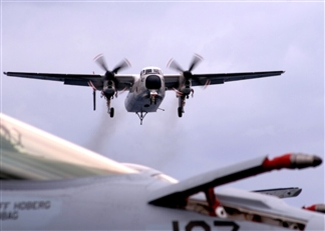 A C-2A Greyhound, assigned to the "Rawhides" of Fleet Logistics Support Squadron 40, prepares to land aboard the Nimitz-class aircraft carrier USS Theodore Roosevelt, April 3, 2008. 