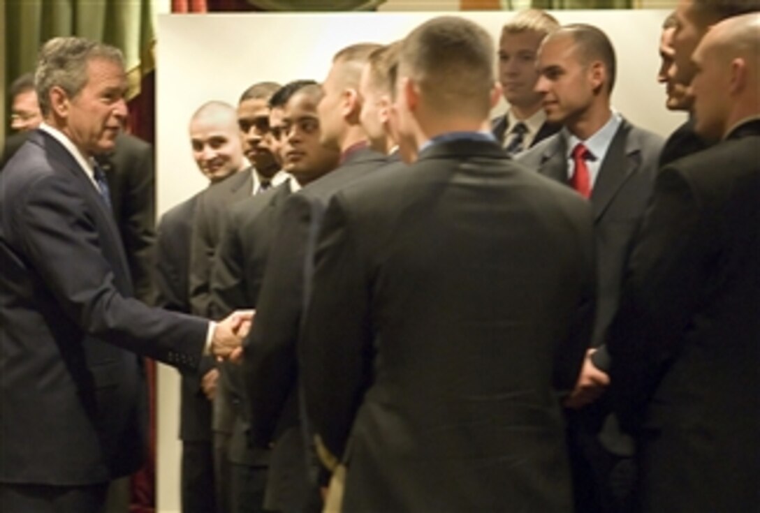 President George W. Bush thanks U.S. Marines for their service during the NATO summit in Bucharest, Romania, April 4, 2008.  NATO defense ministers and other world leaders gathered there for a three-day summit.  