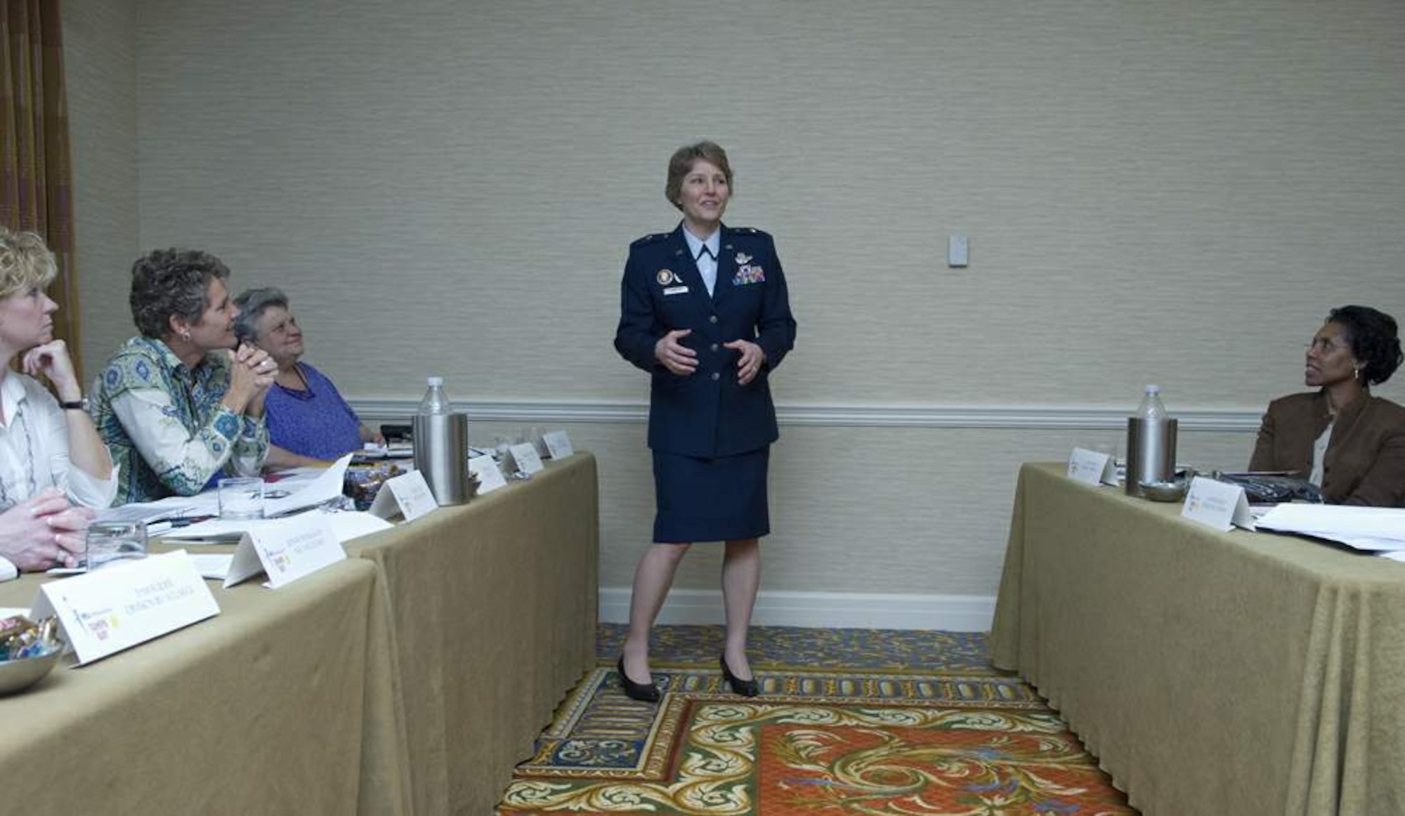 Brig. Gen. Michele D. Johnson answers questions from members of the NCAA Women's Basketball Coaches Association Board of Directors meeting about her career and the importance of preparing young woman athletes
for careers in and out of sports April 4 in Tampa, Fla. General Johnson is the most decorated female athlete in U.S. Air Force Academy history. She was selected by the NCAA to speak to women athletes and participate at numerous NCAA events before the 2008 NCAA Women's Final Four basketball tournament. General Johnson is the deputy director on the war on terrorism, Strategic Plans and Policy Directorate on the Joint Staff at the Pentagon. (U.S. Air Force photo/Staff Sgt. Bennie J. Davis III)

