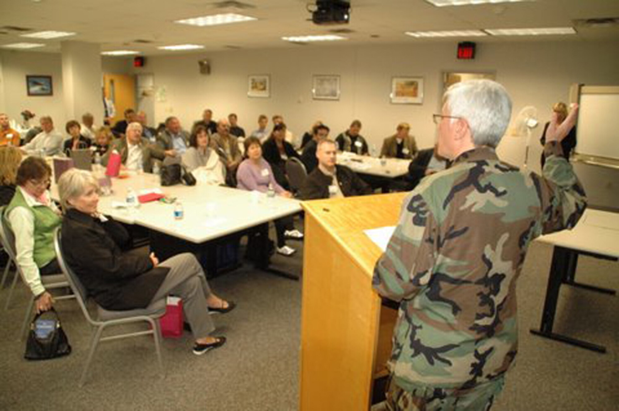 WRIGHT-PATTERSON AFB, Ohio - 445th Maintenance Group Commander Col. Anna Schulte gives a briefing to civic leaders from 4th Air Force.  The civic leader group made a stop at Wright-Patterson AFB to tour the 445th Airlift Wing, the base, and the National Museum of the U.S. Air Force.  The civic leader program is designed to showcase the important work citizen airmen and  the Air Force Reserve do for our nation. (U.S. Air Force photo/Tech. Sgt. Charlie Miller) 