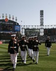Marines of the Silent Drill Platoon perform at the Chicago White Sox home opener April 7.
