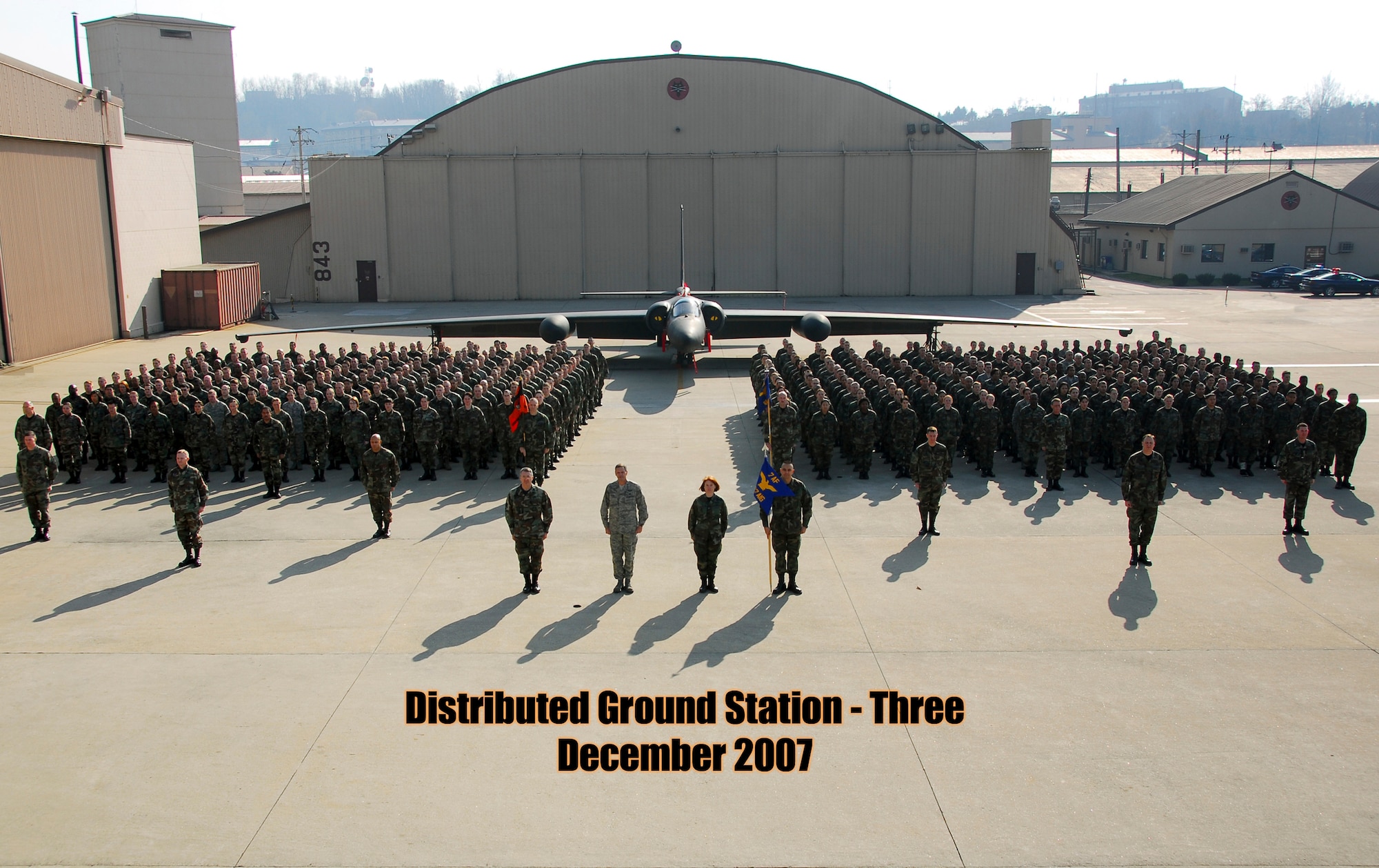 OSAN AIR BASE, Republic of Korea--On Monday, 7 April 2008, Airmen from 7th Air Force formally ‘cased’ the guidon of the 607th Air Intelligence Group and unfurled a new guidon marking their transition to the 694th Intelligence Group under the Air Force Intelligence, Surveillance and Reconnaissance Agency.  (U.S. Air Force photo)  
