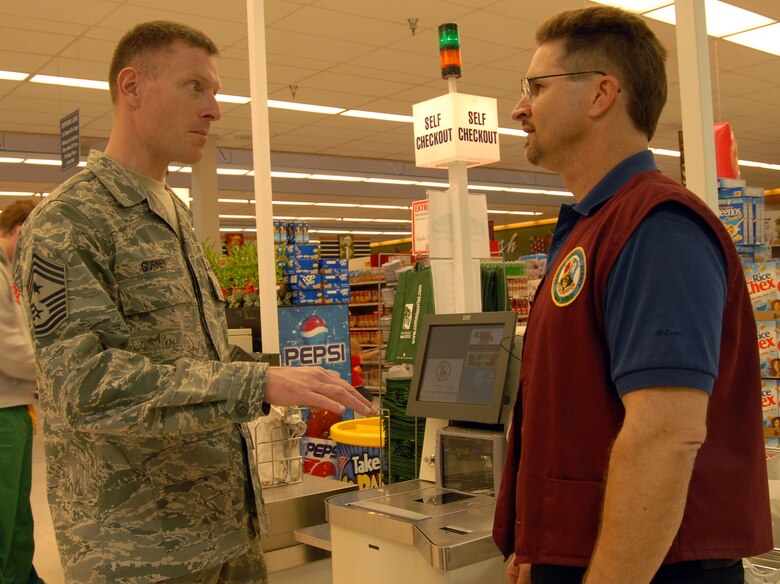 AFMC command chief checks out commissary's new selfcheckout, BX