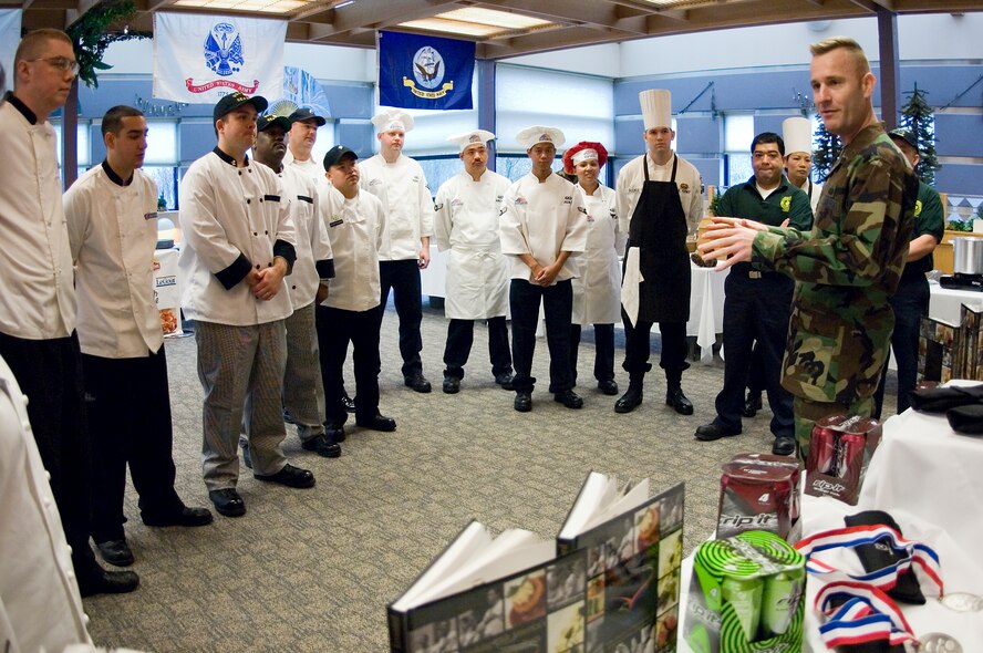 Lt. Col. Christopher Lavallee, 62nd Services Squadron commander, welcomes participants to the Northwest Military Clam Chowder cook-off. (U.S. Air Force photo/Abner Guzman)