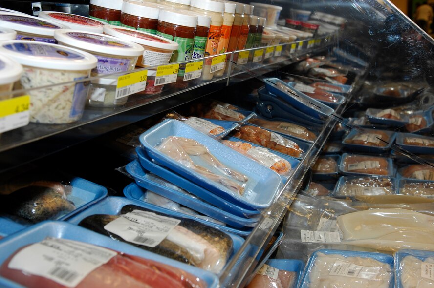 MINOT AIR FORCE BASE, N.D. – The fresh fish counter opened here April 2 showing the large variety of fish and seafood available to commissary consumers.  Among the many choices are walleye, salmon and frog legs. If the customer sees an item on the product list that is not currently in the store, they can order by Wednesday and receive the order the following Wednesday. (U.S. Air Force photo by Staff Sgt. Thomas Dow)