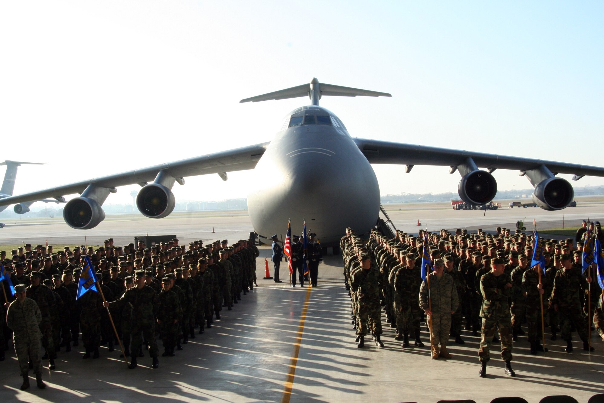 WRIGHT-PATTERSON AFB, Ohio - Members of the 445th Airlift Wing stand in formation during the wing's Change of Command Ceremony April 6, 2008. The wing said goodbye to Brig. Gen Bruce E. Davis as he relinquished command and welcomed the incoming commander, Col. Stephen D. Goeman. The ceremony took place in the wings new Fuel System Maintenance Hangar with a massive C-5 as the backdrop. (U.S. Air Force photo/Maj. Jose Cardenas)