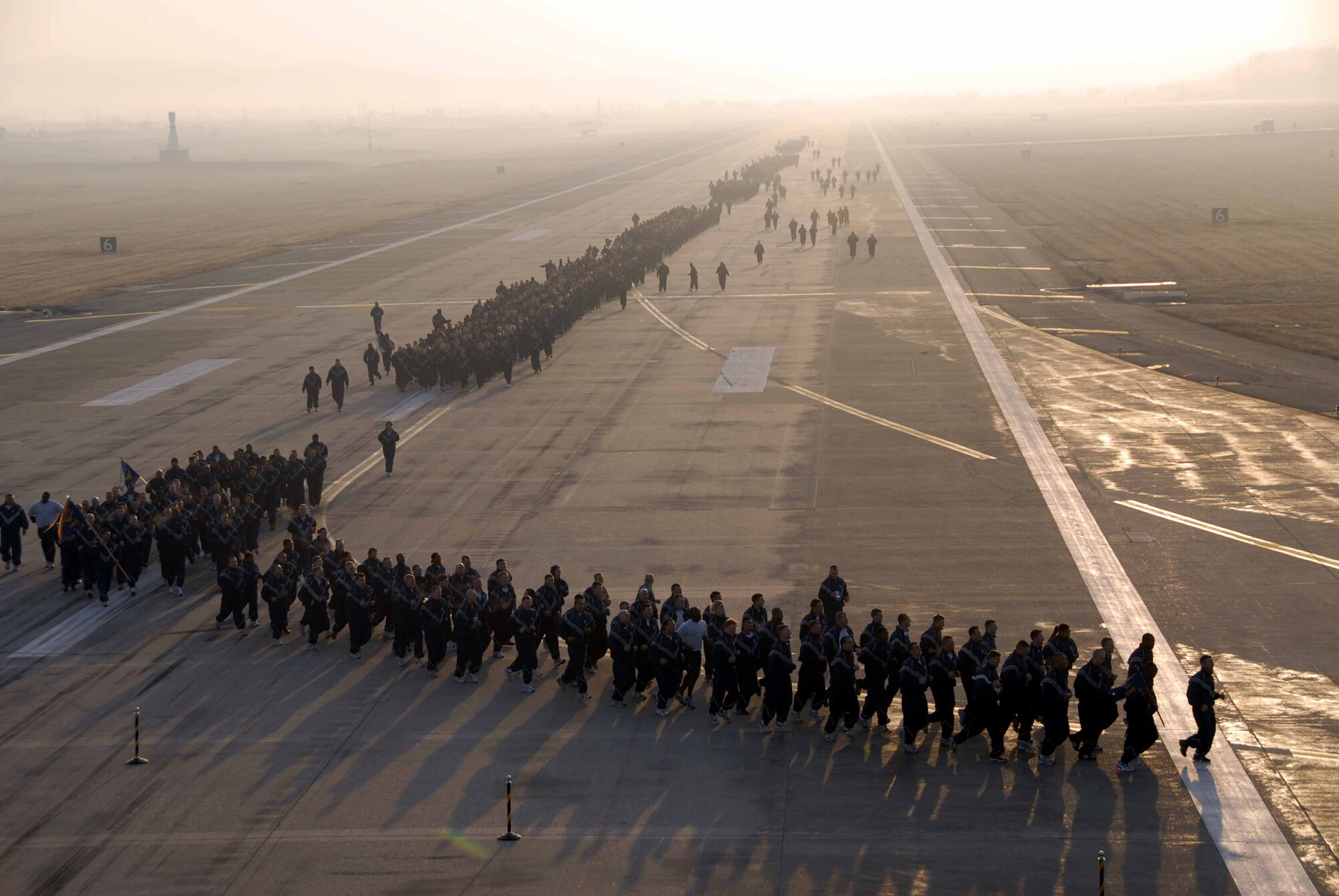 OSAN AIR BASE, Republic of Korea -- Members of Team Osan enjoy an early morning jog around the flightline during the Air Power run April 4. (U.S. Air Force photo/Senior Airman Christopher Boitz)