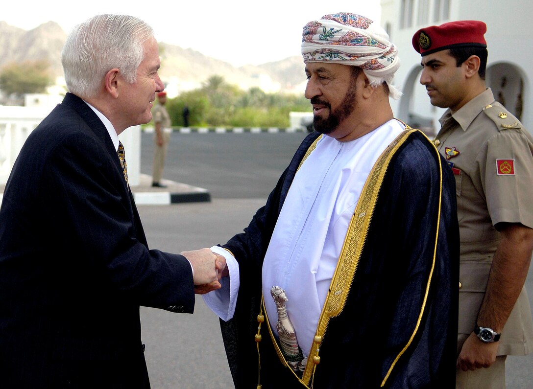 Omani Defense Minister Sayyid Badr bin Saud al-Busaidi, right, greets U.S. Defense Secretary Robert M. Gates, left, upon his arrival in Muscat, Oman, April 5, 2008. Gates stopped in Muscat on his way back from the NATO Summit in Bucharest, Romania, to discuss defense issues. 
