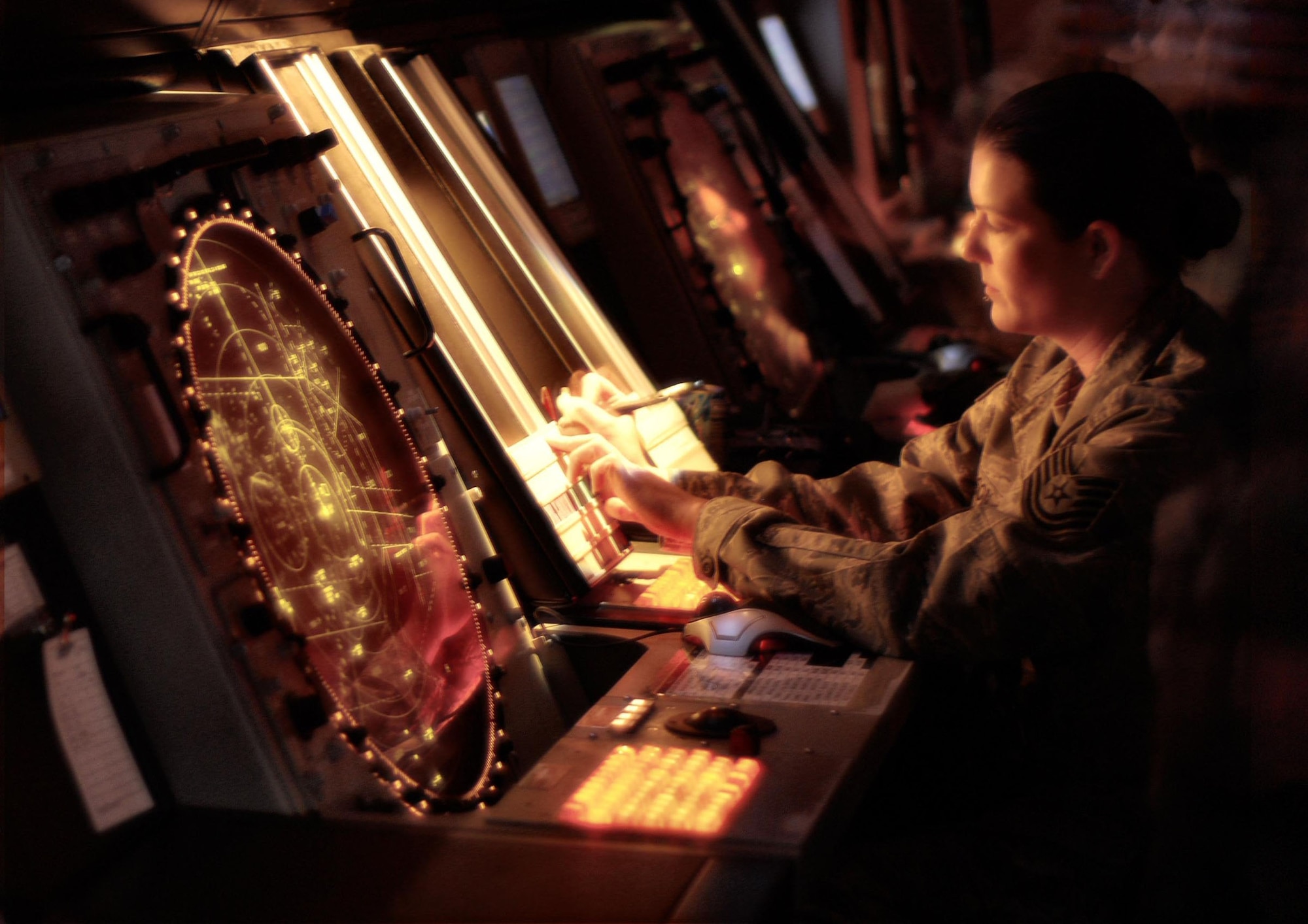 KUNSAN AIR BASE, Republic of Korea -- Technical Sergeant Shelia Stenson, 8th Operations Support Squadron Radar Approach Control controller, guides sorties back to base here April 4. (U.S. Air Force photo/Chief Master Sgt. William McElligott)
