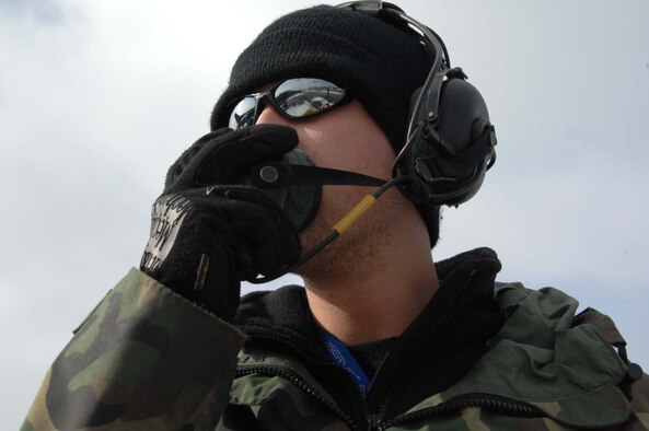 EIELSON AFB, Alaska -- Airman 1st Class Danny Reynolds conducts a pre-flight inspection during Red Flag-Alaska 08-2 April 8 here.  Airman Reynolds is an F-16 Avionics Specialist from Misawa AB, Japan.  On an average, more than 700 people and up to 60 aircraft deploy to Eielson, and an additional 500 people and 40 aircraft deploy to Elmendorf Air Force Base, for each RED FLAG-Alaska exercise.  (U.S. Air Force photo/Staff Sgt. Tia Schroeder) 