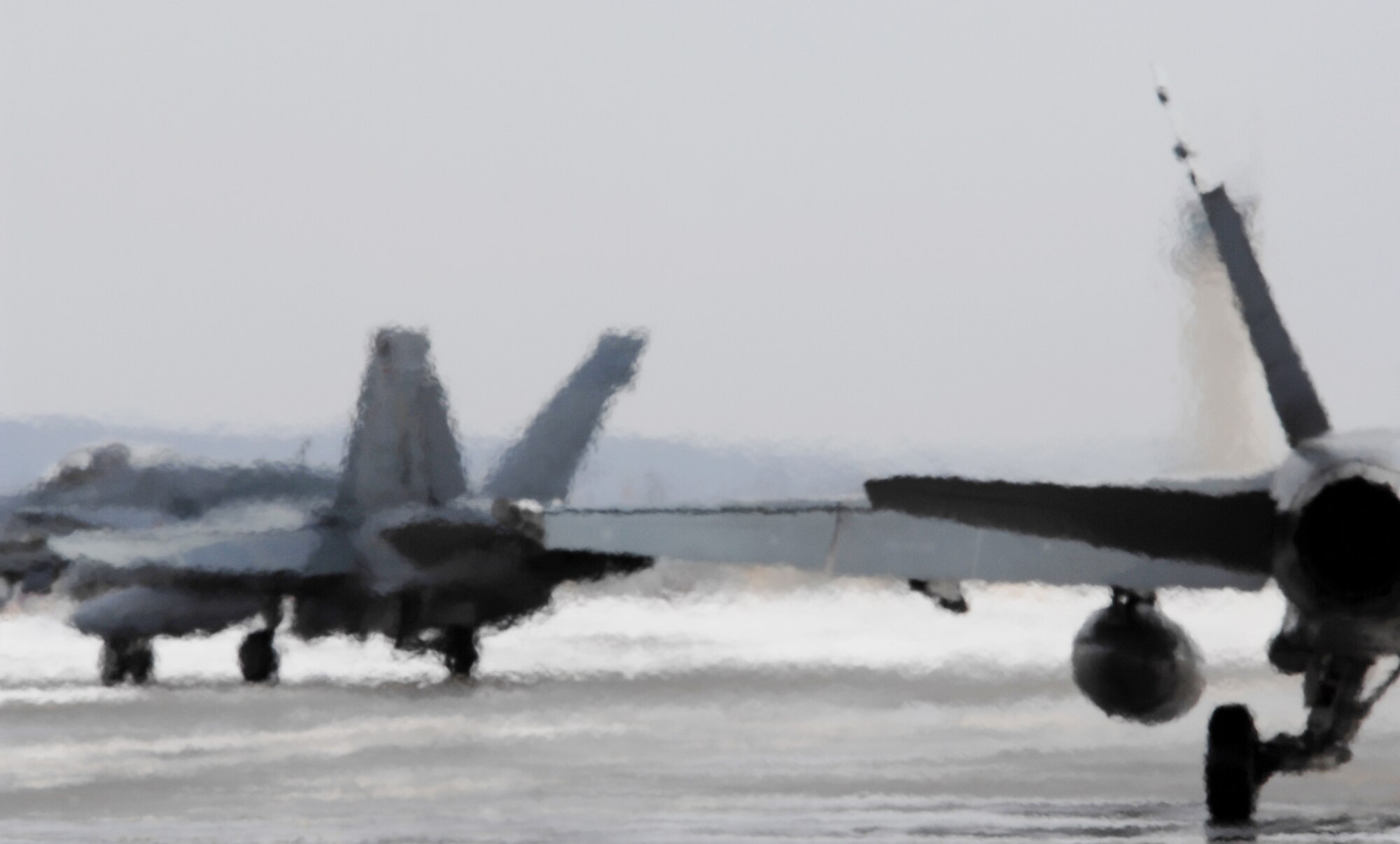 Two  FA-18 Hornet from the Canadian Air Force taxi down the flight line at Eielson Air Force Base, Alaska prior to take off for a  training sortie over the Pacific Alaska Range Complex on April 7, 2008. Canada Air Force is participants of the Red Flag-Alaska 08-02 exercise.   Red Flag-Alaska is a series of Pacific Air Forces field training exercises for U.S Forces and allies that provide joint offensive counter-air, indirection, close air support, and large force employment training in a simulated combat environment.

(U.S Air Force Photo by Technical Sgt. Eric T. Sheler)
