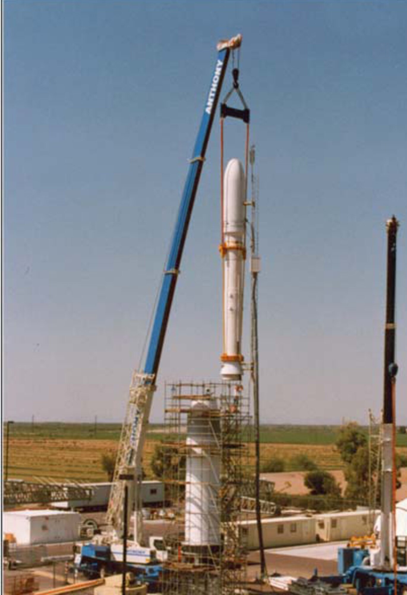 VANDENBERG AIR FORCE BASE, Calif -- A Peacekeeper Minotaur IV rocket is in its last stages of assembly. Minotaur IVs much like this one will be launched from Vandenberg in an effort to place smaller payloads in space at a smaller price. The program spawns from the ICBM program that spawned during the Cold War. The reuse of the rockets estimates a $70 million difference per launch.(Courtesy Photo) 