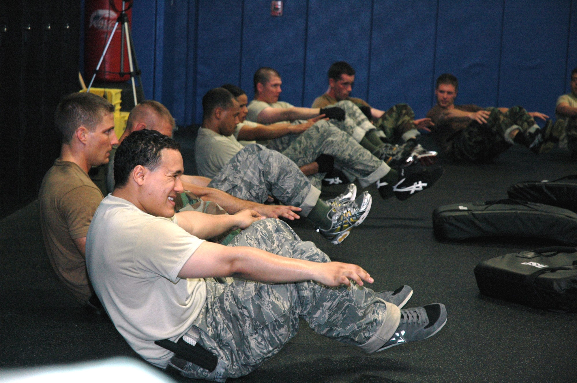 Students in the Air Force Phoenix Raven Course exercise as part of training in the course April 4, 2008, in the U.S. Air Force Expeditionary Center on Fort Dix, N.J.  The course, taught by the Center's 421st Combat Training Squadron, teaches Air Force security forces, Army military police and Navy security forces in areas of self defense, aircraft security, verbal judo and many related courses.  (U.S. Air Force Photo/Tech. Sgt. Scott T. Sturkol)