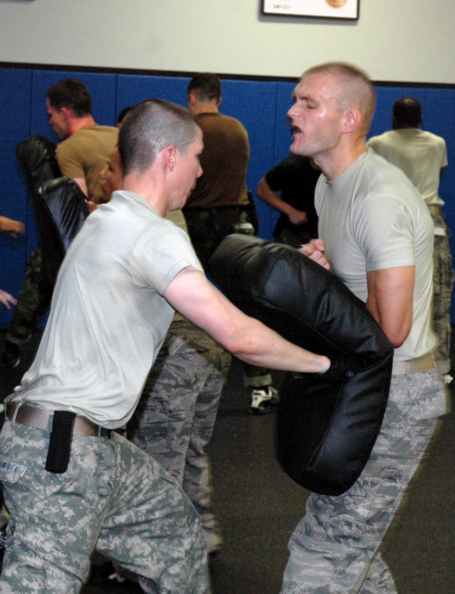 Students in the Air Force Phoenix Raven Course practice self defense moves using a baton during training in the course April 4, 2008, in the U.S. Air Force Expeditionary Center on Fort Dix, N.J.  The course, taught by the Center's 421st Combat Training Squadron, teaches Air Force security forces, Army military police and Navy security forces in areas of self defense, aircraft security, verbal judo and many related courses.  (U.S. Air Force Photo/Tech. Sgt. Scott T. Sturkol)