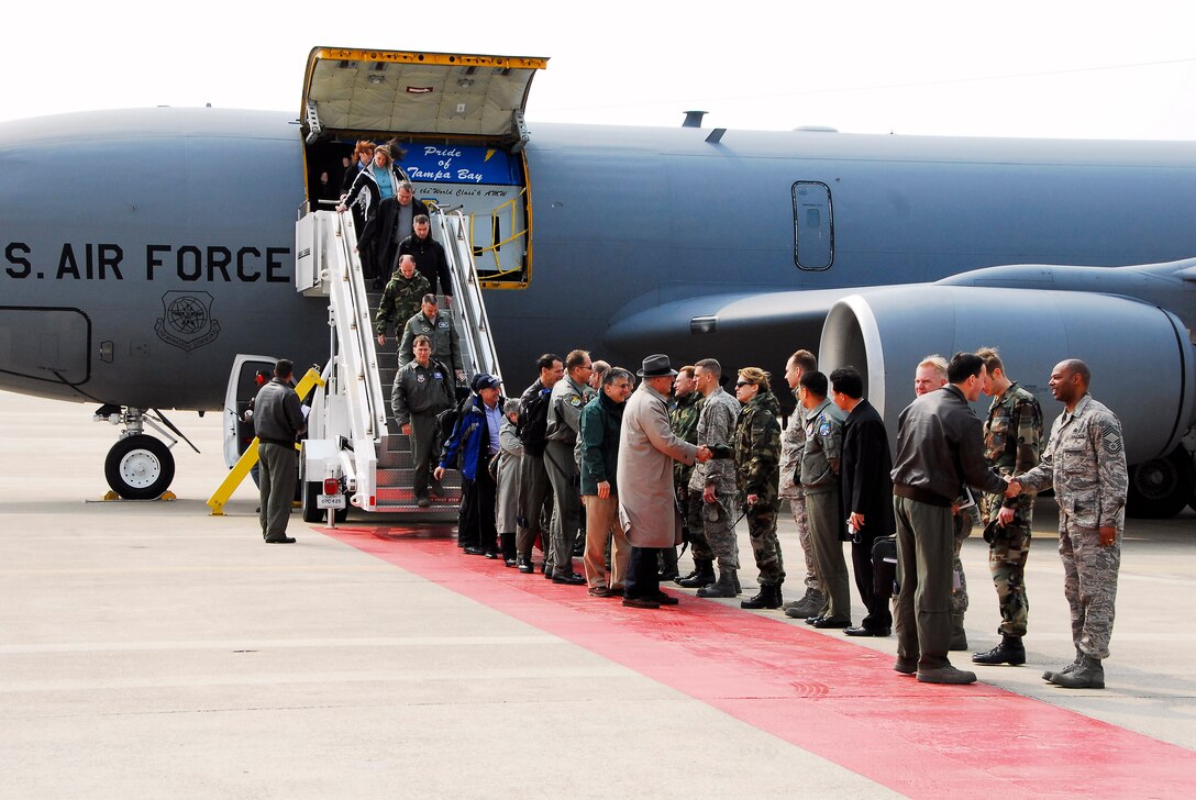 Leaders of Kunsan Air Base, South Korea, greet Air Force Board members as they arrive April 2. The board members visited Kunsan for a first-hand look at the base and its mission.  Kunsan is the home of the 8th Fighter Wing.  (U.S. Air Force photo/Tech. Sgt. Quinton T. Burris) 