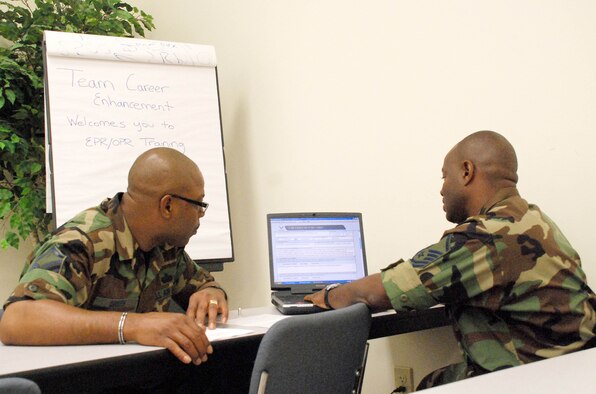 Master Sgt. Jon Green, chief of career enhancement for the 920th Rescue Wing, (pictured left) gives guidance to Master Sgt. Selwyn McConney, flight chief for the 920th weapons flight, on an Enlisted Performance Report. More than 40 Rescue Reservists attended the wing's first monthly performance report workshop designed to not only train supervisors, but to give them hands-on assistance with their reports.  The performance report is an important tool used by Air Force Reservists to evaluate and mentor Airmen. (U.S. Air Force Photo/Master Sgt Raymond F. Padgett)