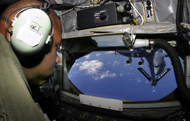 ANDREWS AIR FORCE BASE, Md. -- Tech. Sgt. Willie Cooper, 756th Air Refueling Squadron boom operator, works the control guiding the refueling nozzle on a KC-135 Stratotanker aircraft during a refueling mission over Atlantic City, N.J., March 15. (U.S. Air Force photo/Bobby Jones)