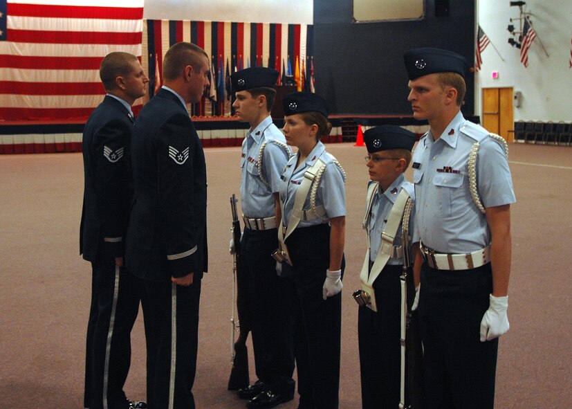 BARKSDALE AIR FORCE BASE, La, - The Civil Air Patrol Louisiana Wing Color Guard team is inspected by members of the Barksdale Honor Guard during a competition in Hoban Hall here. The occasion marks the first time in several years Barksdale has hosted the regional competition.