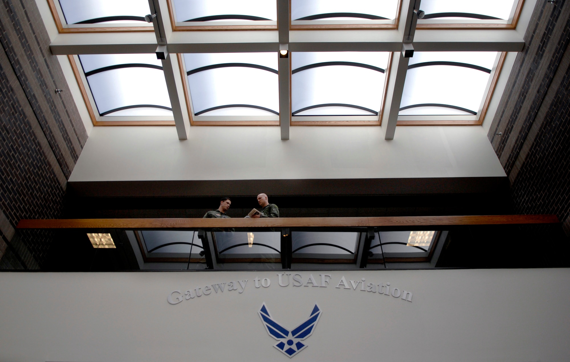 Student pilots 2nd Lts. Dylan Rudolph and Keith Woods discuss academic ideas at the Doss Aviation Initial Flight Screening Course  April 7 in Pueblo, Colo. The purpose of the course is to screen Air Force aviation candidates and prepare them for the more rigorous flight school programs that will place them behind the most powerful, technologically advanced airplanes in the world. (U.S. Air Force photo/Tech. Sgt. Cecilio Ricardo) 