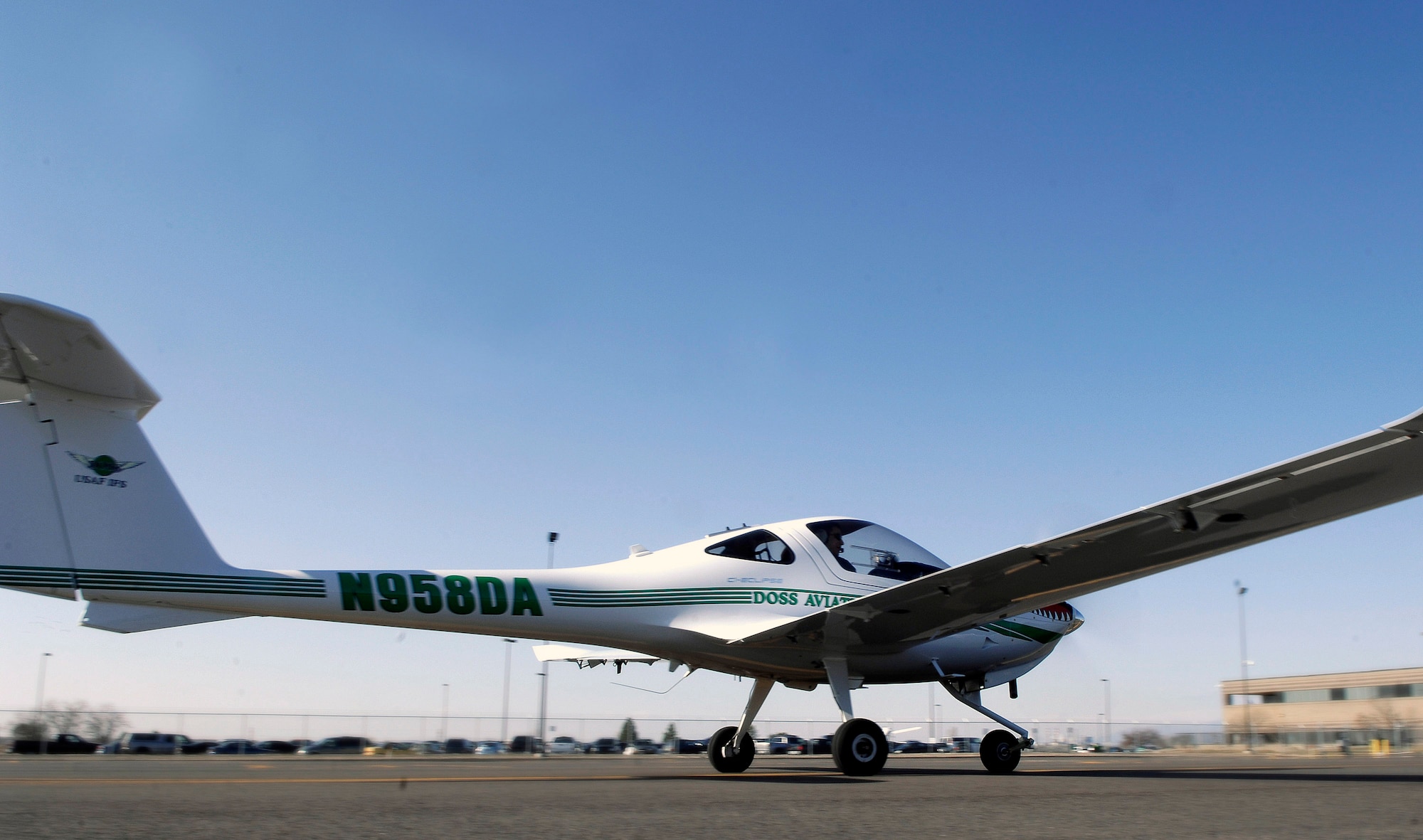 A student pilot taxis a DA-20 aircraft on the Doss Aviation flightline during an Initial Flight Screening Course April 7 in Pueblo, Colo. The purpose of the course is to screen aviation candidates and prepare them for the more rigorous flight school programs that will place them behind the most powerful, technologically advanced airplanes in the world. (U.S. Air Force photo/Tech. Sgt. Cecilio Ricardo) 