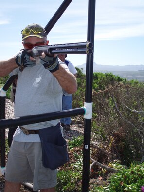 Mike Panella, a member of the Vandeneberg Rod and Gun Club, takes aim at a target during a round of sporting clays. The club offers shooting enthusiasts to try there luck at sporting clay on the second and fourth sunday a month, starting at 9 a.m.(U.S. Air Force Photo)