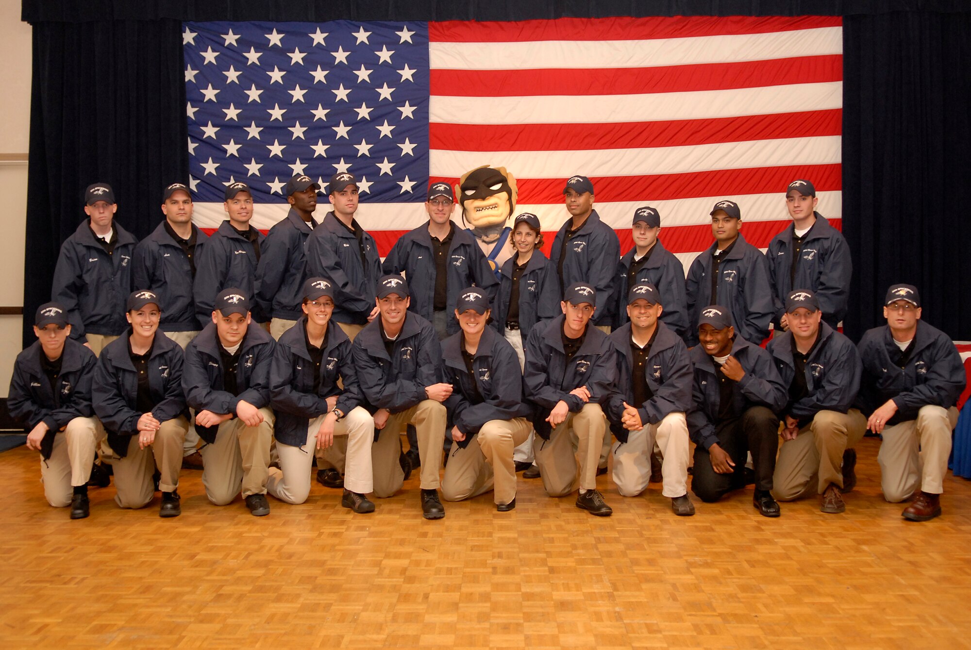 VANDENBERG AIR FORCE BASE, Calif. -- The 2008 Vandenberg Guardian Challenge team huddle together for a group photo during the kickoff event on April 4. The event was held to present the team to the 30th Space Wing and to provide the team with competition uniforms. Guardian Challenge in the only space and missile competition in the Air Force. (U.S. Air Force photo/Airman 1st Class Christian Thomas) 
