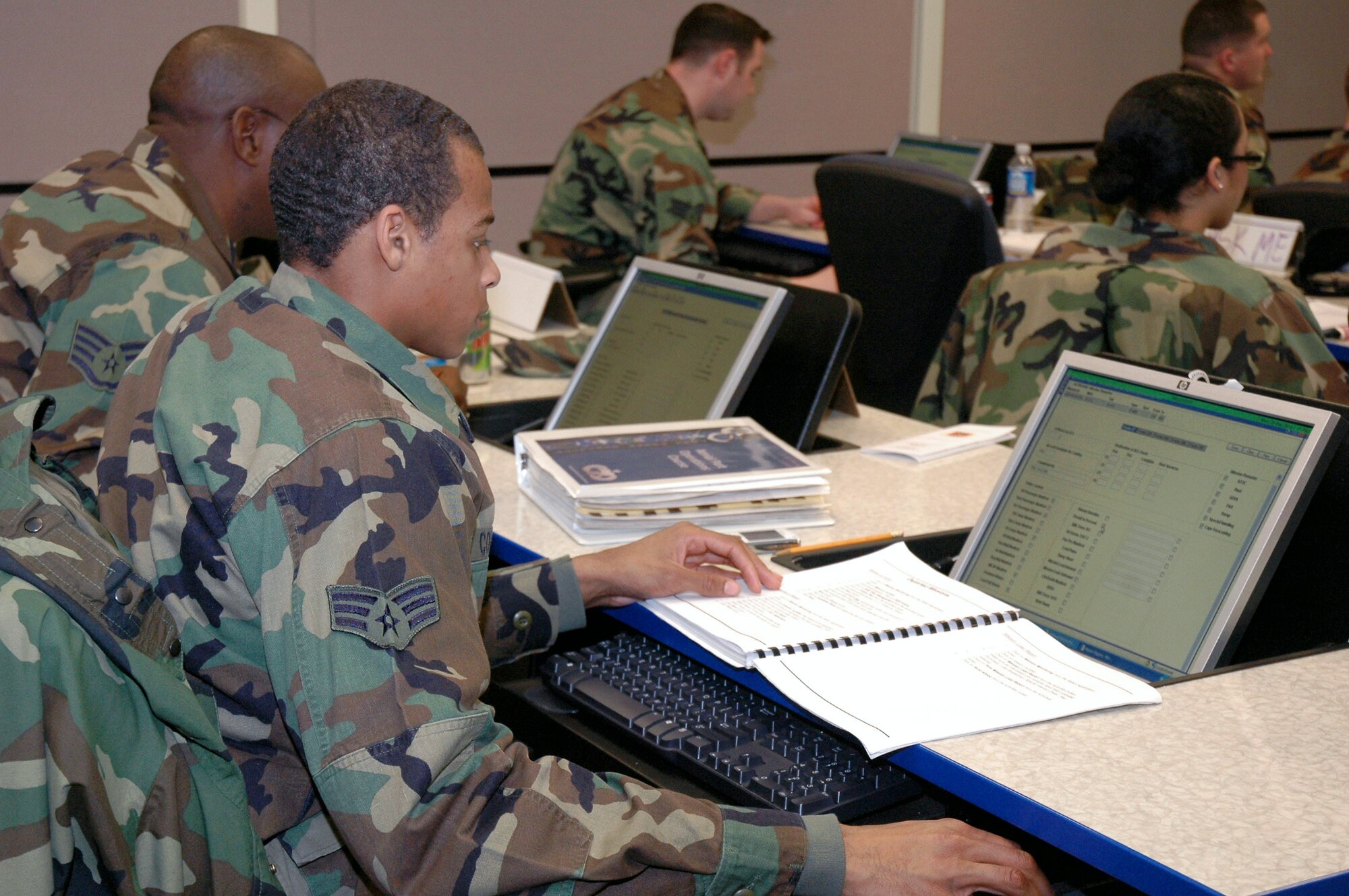 Air transportation Airmen work on computers during the U.S. Air Force Expeditionary Center's Aerial Port Operations Course.  In addition to the in-residence courses at Fort Dix, N.J., "aerial porters" have numerous distance learning courses available to them through the center's distance learning program. (U.S. Air Force Photo/Tech. Sgt. Scott T. Sturkol)