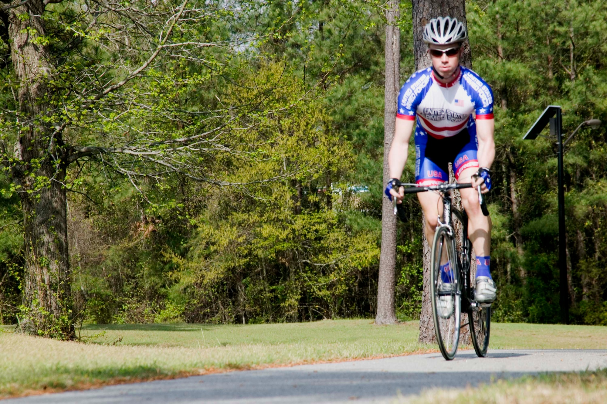 SHAW AIR FORCE BASE, S.C. -- Second Lt. Zach Garrett, 20th Aerospace Medicine Squadron, cycles around the Palmetto Trail April 4 for training and preparation. The lieutenant was selected to represent the United States Armed Forces in cycling for this year. The selection process is highly competitive as he is only one of eight members on the team. (U.S. Air Force photo/Staff Sgt. John Gordinier)